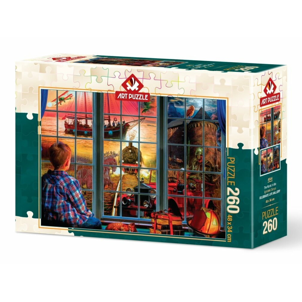 Una scatola di puzzle mostra un ragazzo che guarda fuori da una finestra varie scene, tra cui una nave, un treno e un castello.