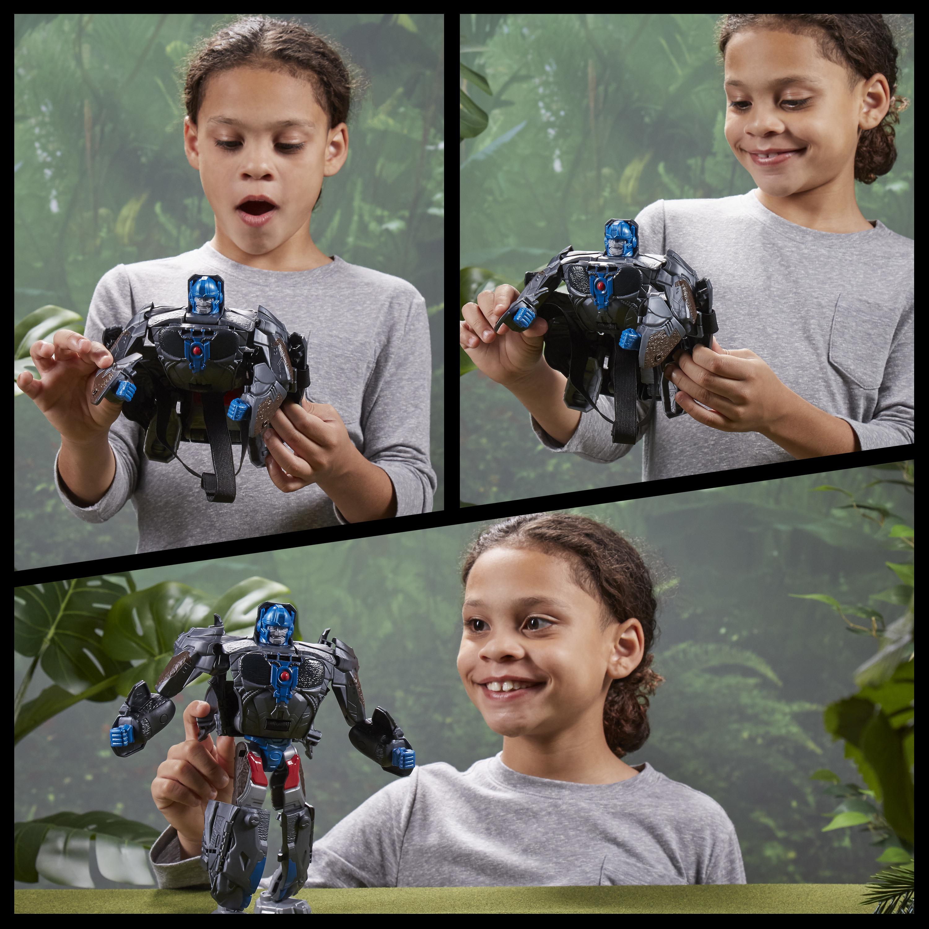 Un niño sostiene un robot de juguete. El robot es negro, azul y rojo. El niño sonríe frente a un fondo verde.