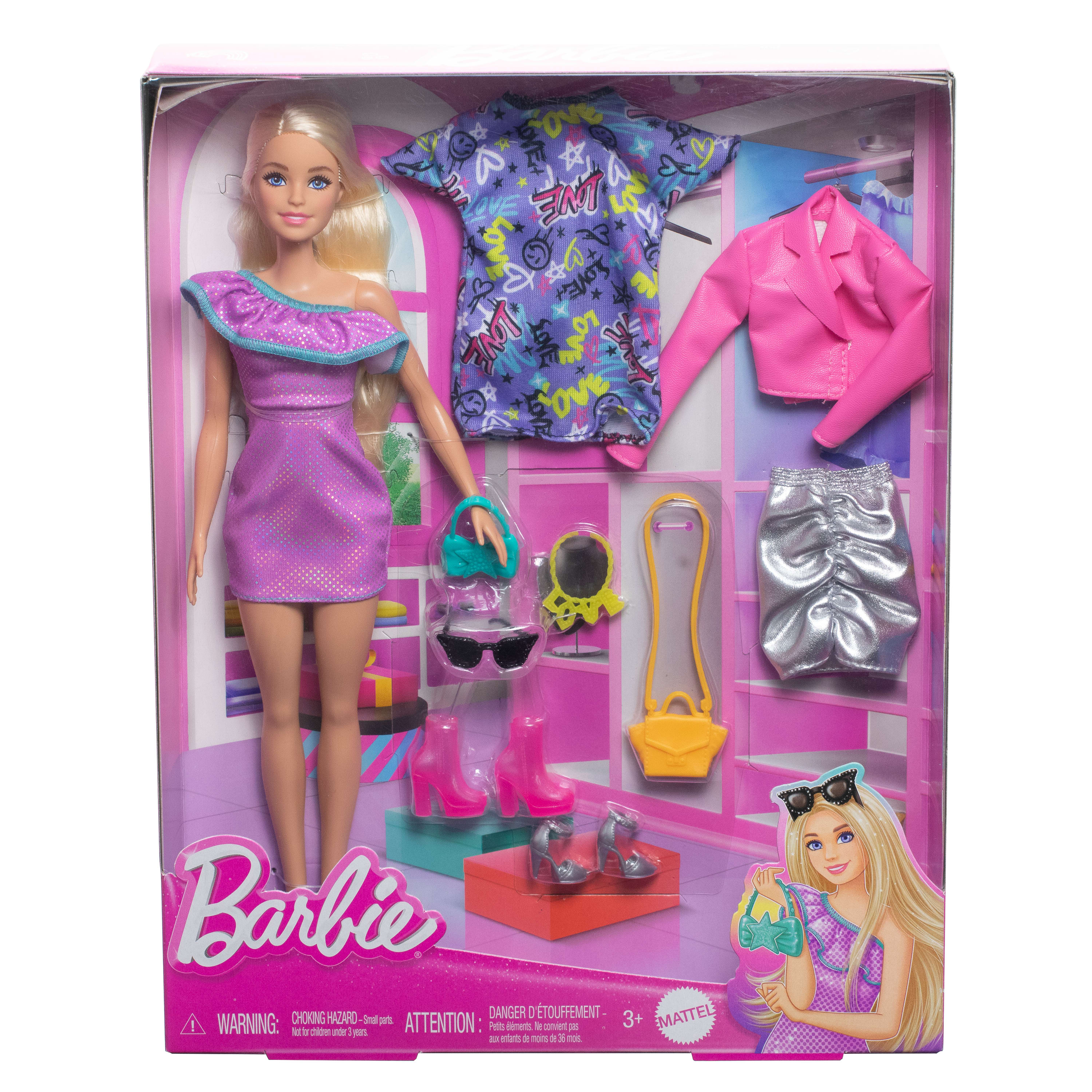 Lalka Barbie w opakowaniu z akcesoriami, w tym ubraniami i butami. Opakowanie jest różowe.