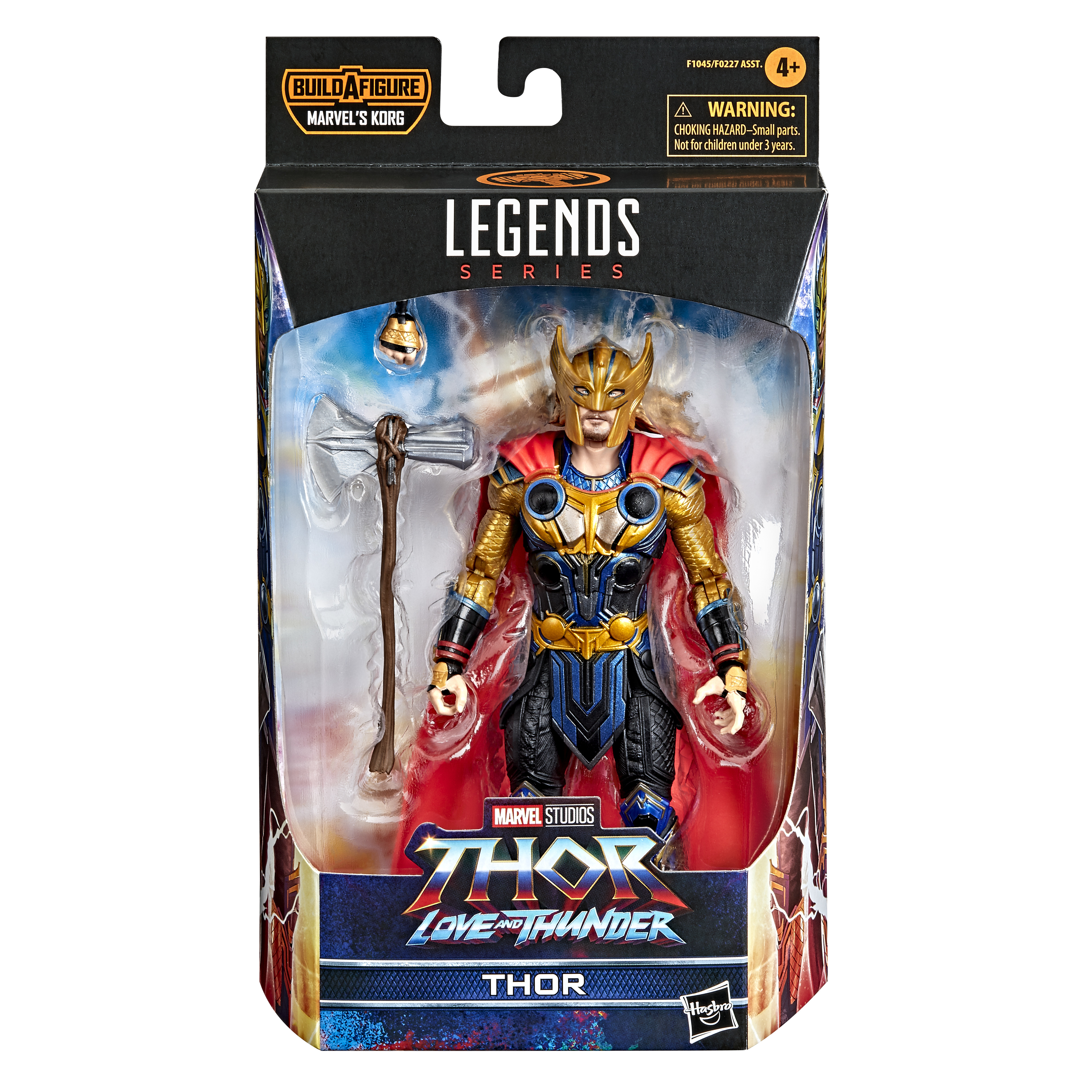 Action figure di Thor in scatola. Indossa un'armatura dorata, un mantello rosso e tiene un martello. La scatola ha loghi e avvertenze.
