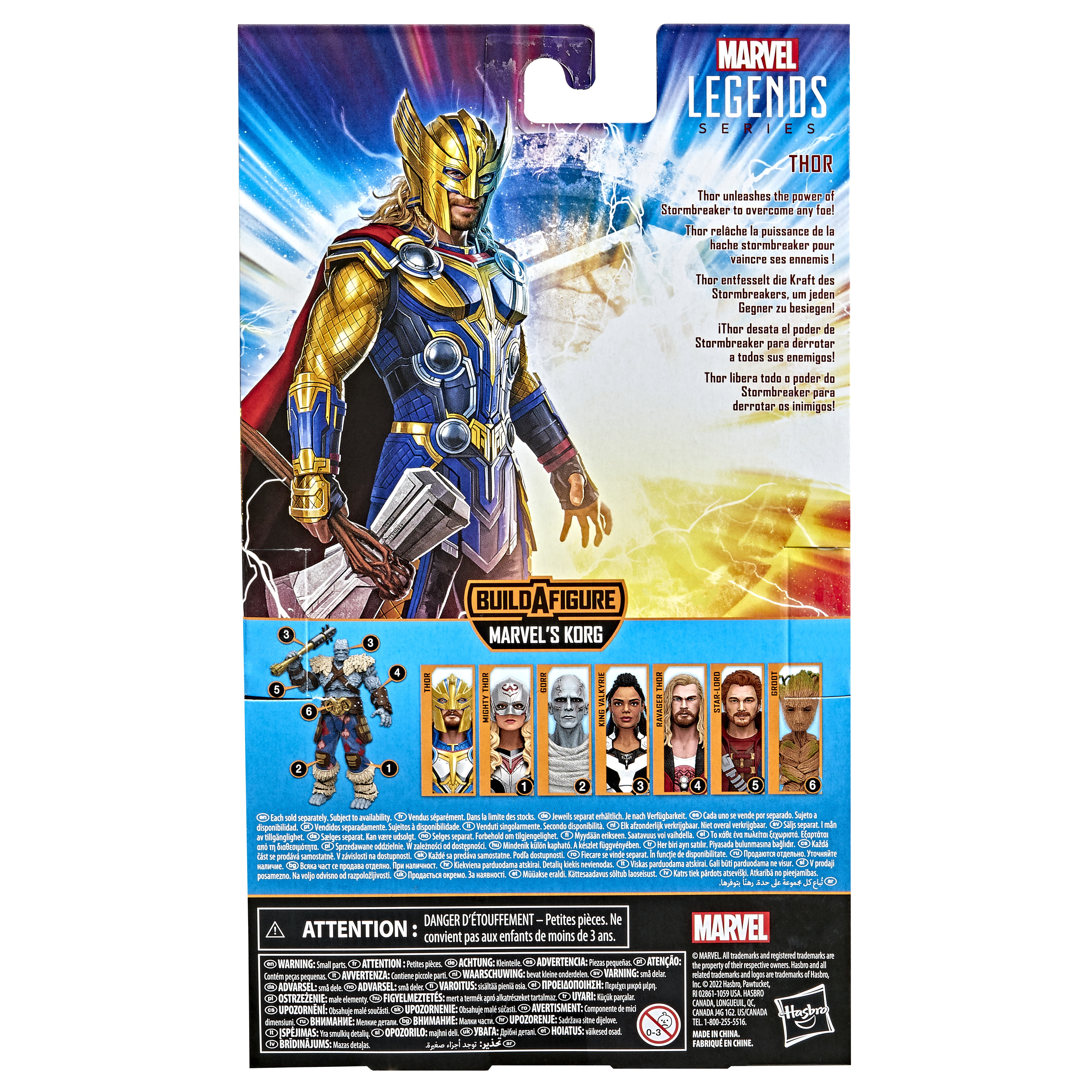 Action figure di Thor su una scatola blu e gialla con altri personaggi Marvel.