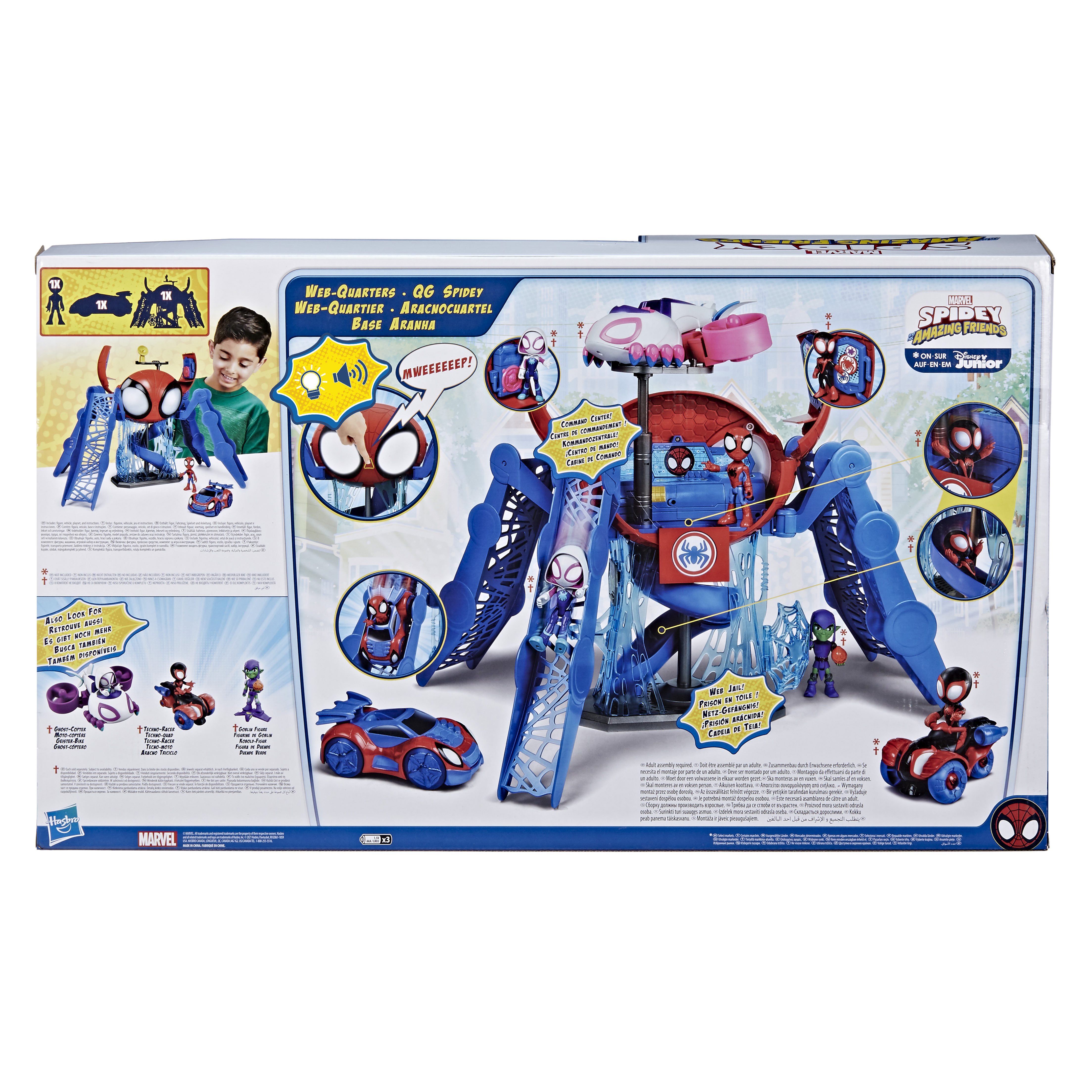 La caja muestra un set de juego de Spidey con figuras. Un niño señala una figura de Spider-Man.
