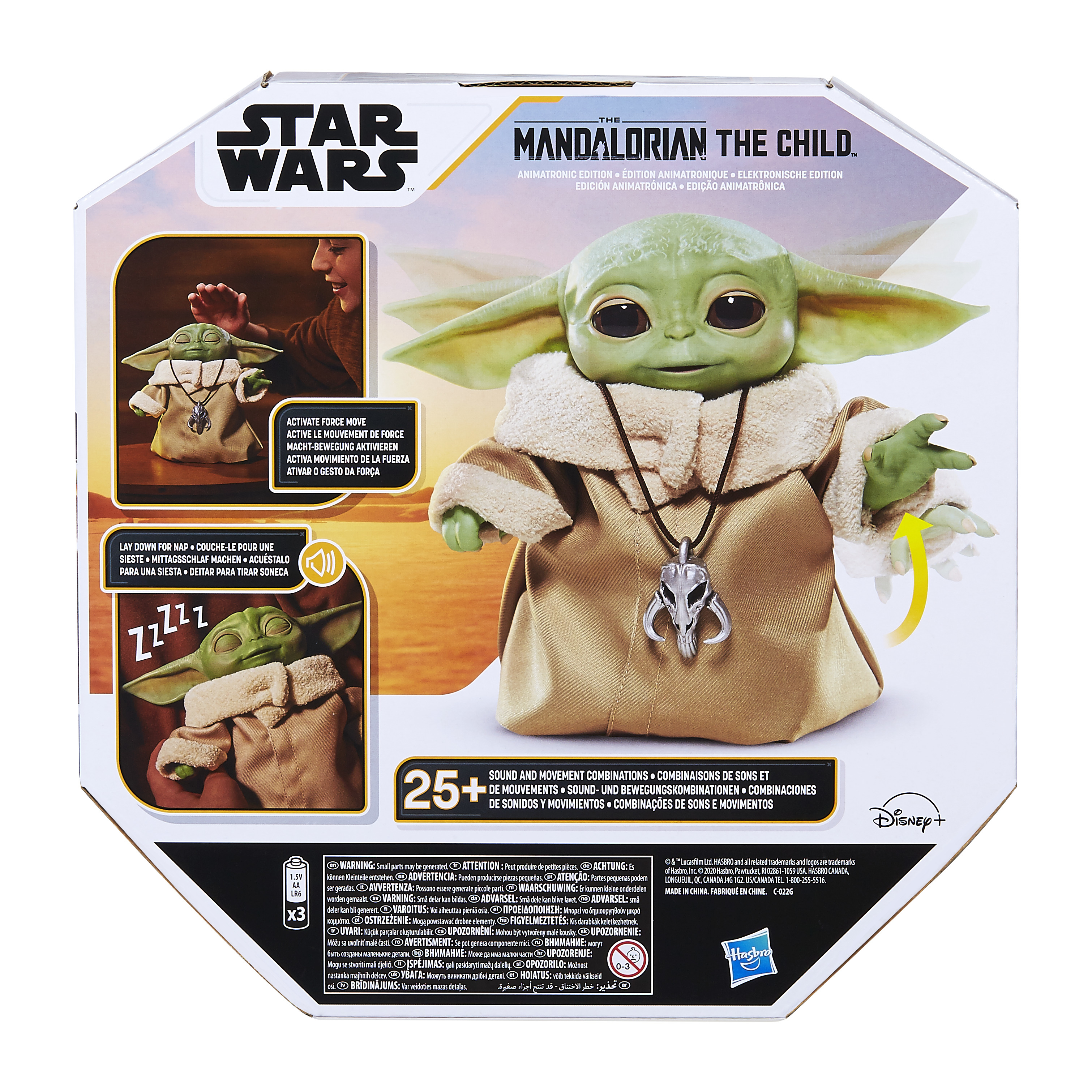 The Child oyuncağı, yeşil ten, büyük kulaklar, bej bir palto giyiyor, gümüş bir kolye ile, bir Star Wars kutusunda.