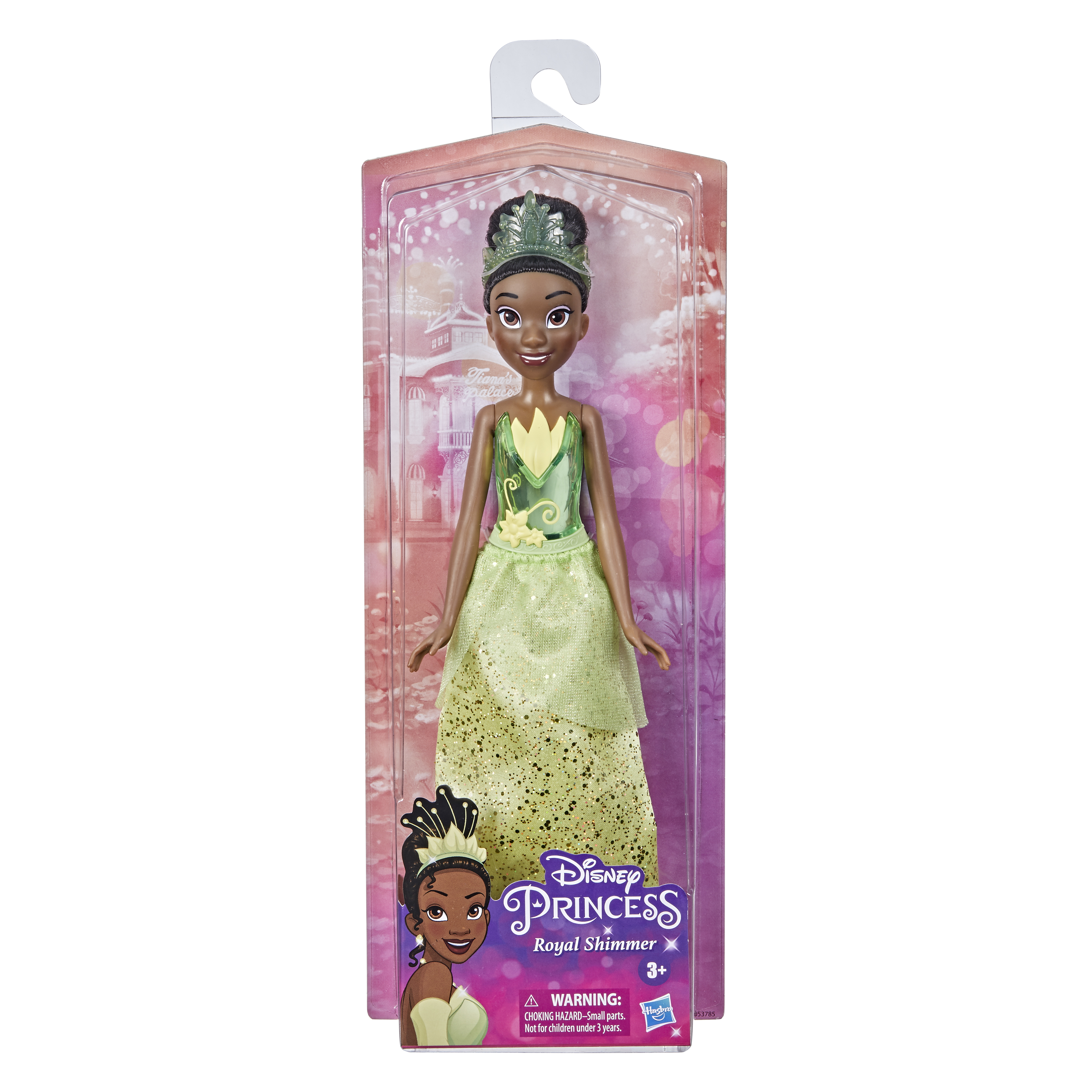 Una bambola Tiana in una confezione. Indossa un vestito verde e una tiara. La confezione ha il marchio Disney Princess.