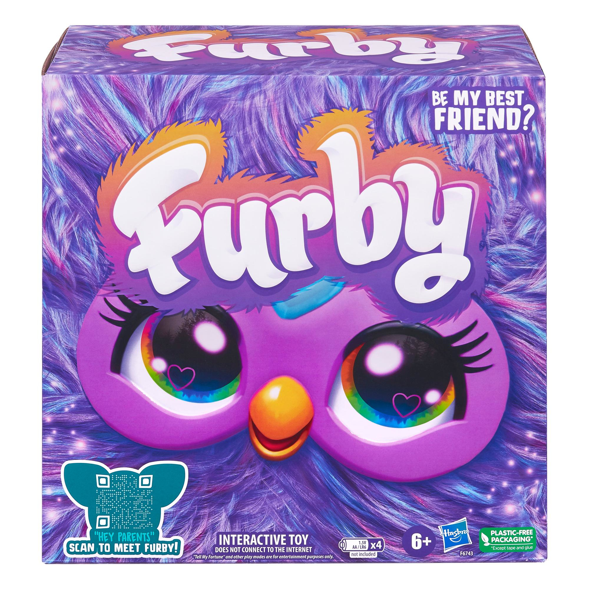 Eine Furby-Spielzeugkiste mit einem lila Gesicht, großen Augen und dem Wort "Furby". Es steht "Be My Best Friend?"