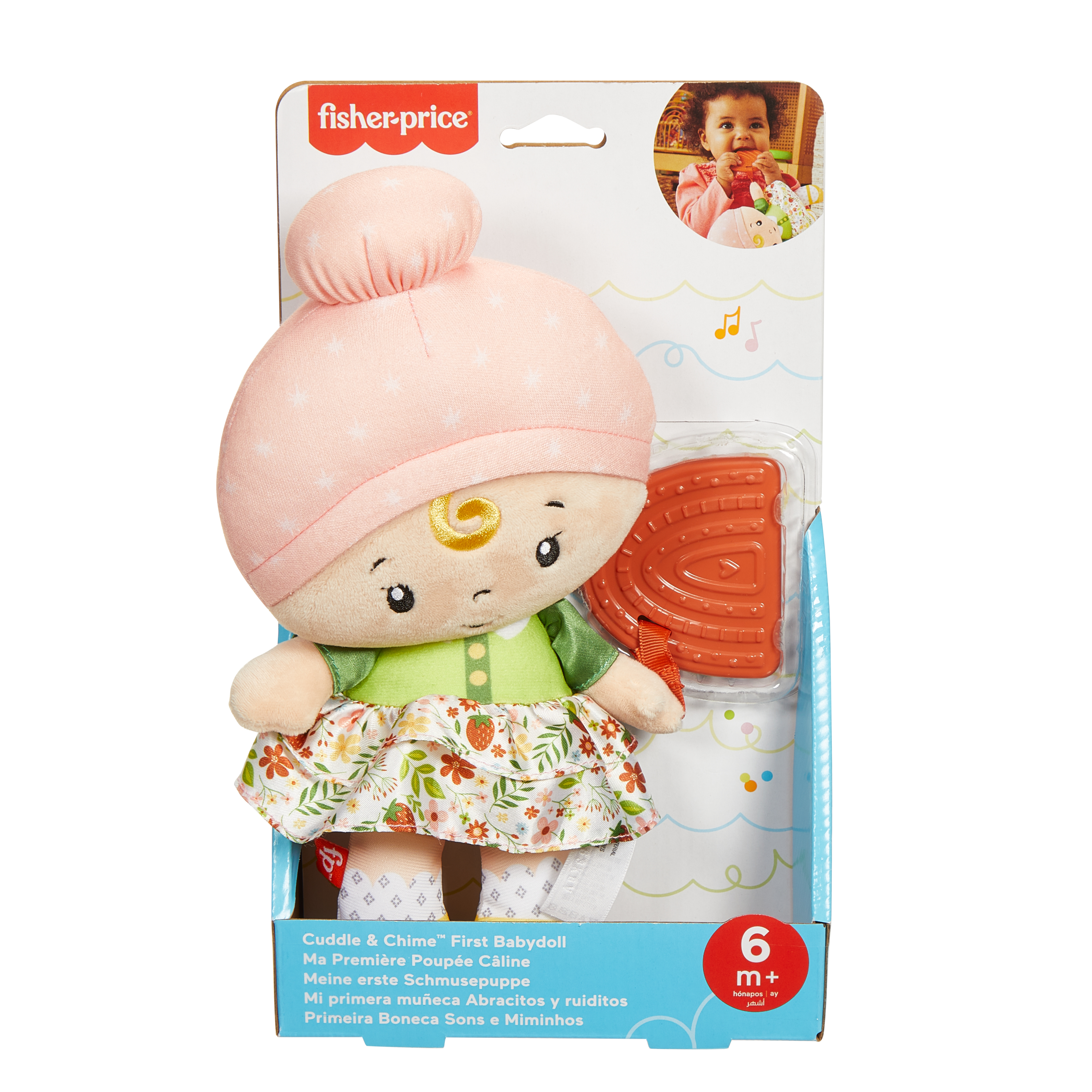 Zabawka dla lalek Fisher-Price w opakowaniu. Lalka ma różowy kapelusz, zieloną sukienkę i kwiatową spódnicę.