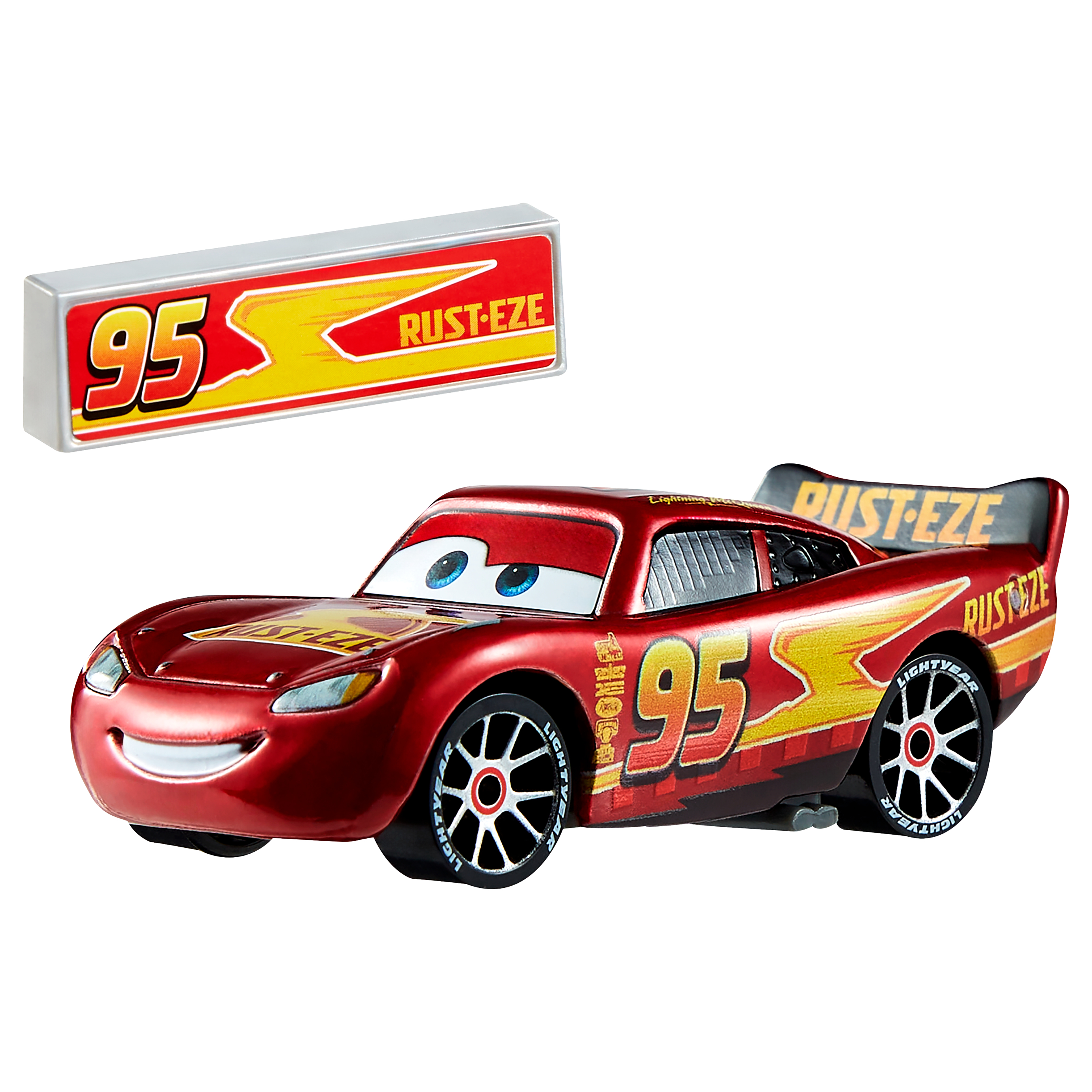 Ein rotes Spielzeugauto mit der Nummer 95 und einem 'Rust-eze'-Schild. Es hat schwarze Räder und blaue Augen, lächelndes Gesicht.