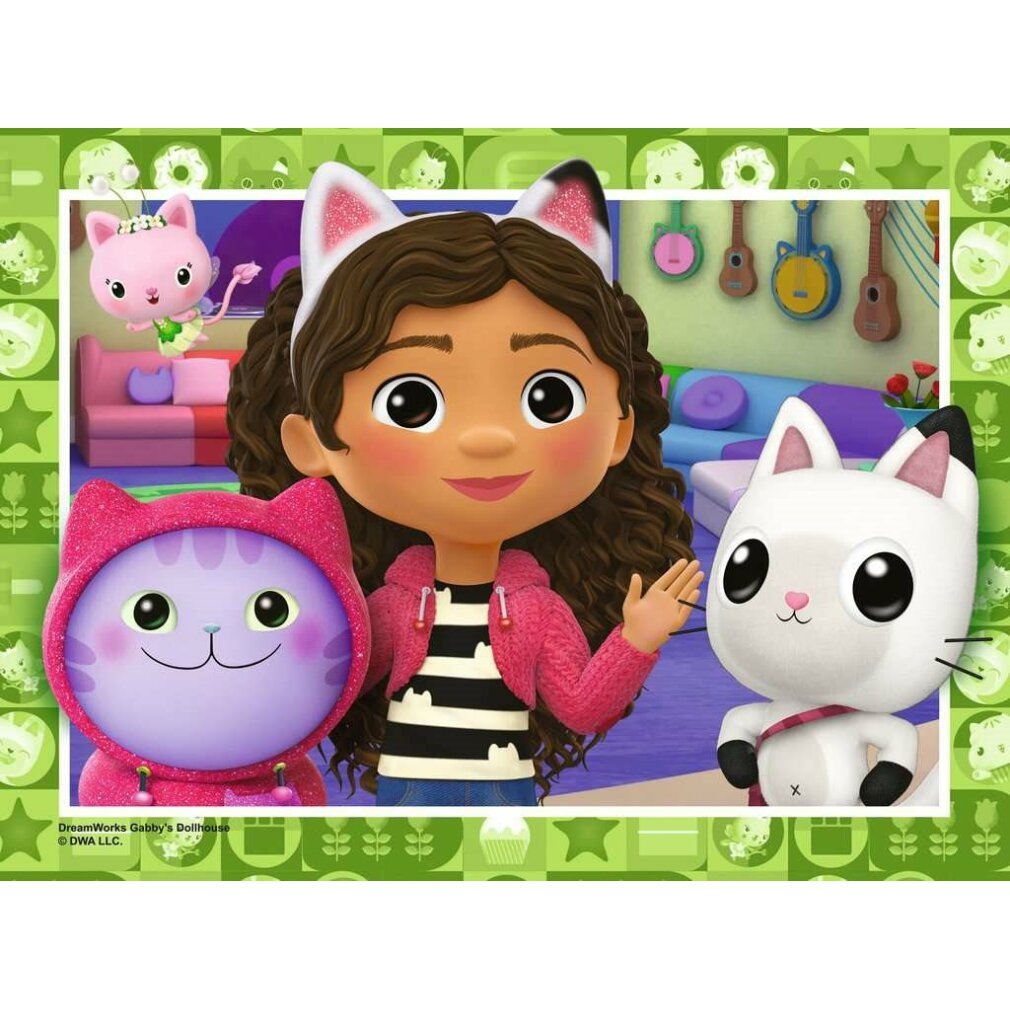 Kreskówka Gabby i postaci kotów. Gabby nosi różową kurtkę i kocie uszy. Inne koty są obecne w pokoju.
