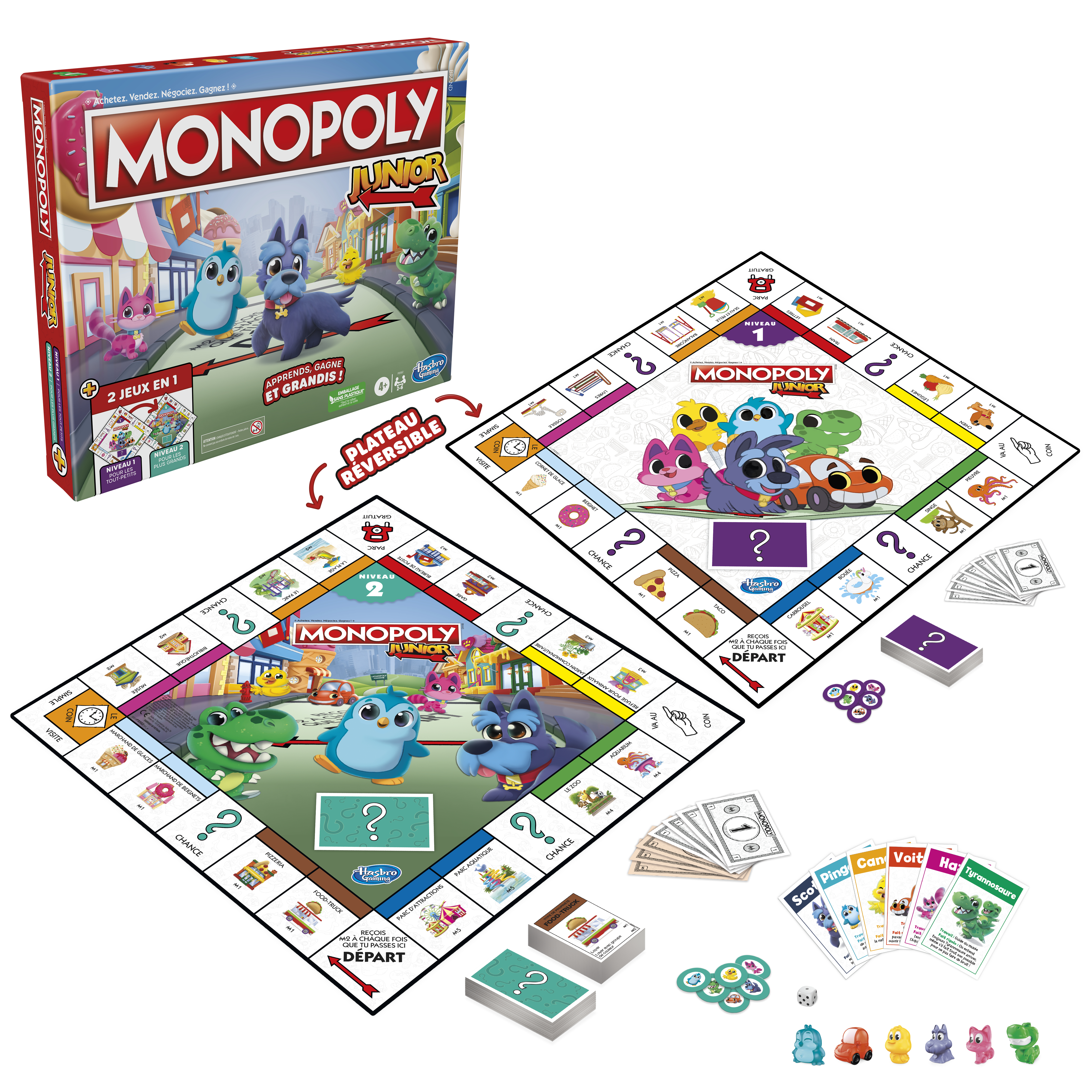 Pudełko gry planszowej Monopoly Junior i widoczne plansze do gry, z postaciami z kreskówek i pionkami.