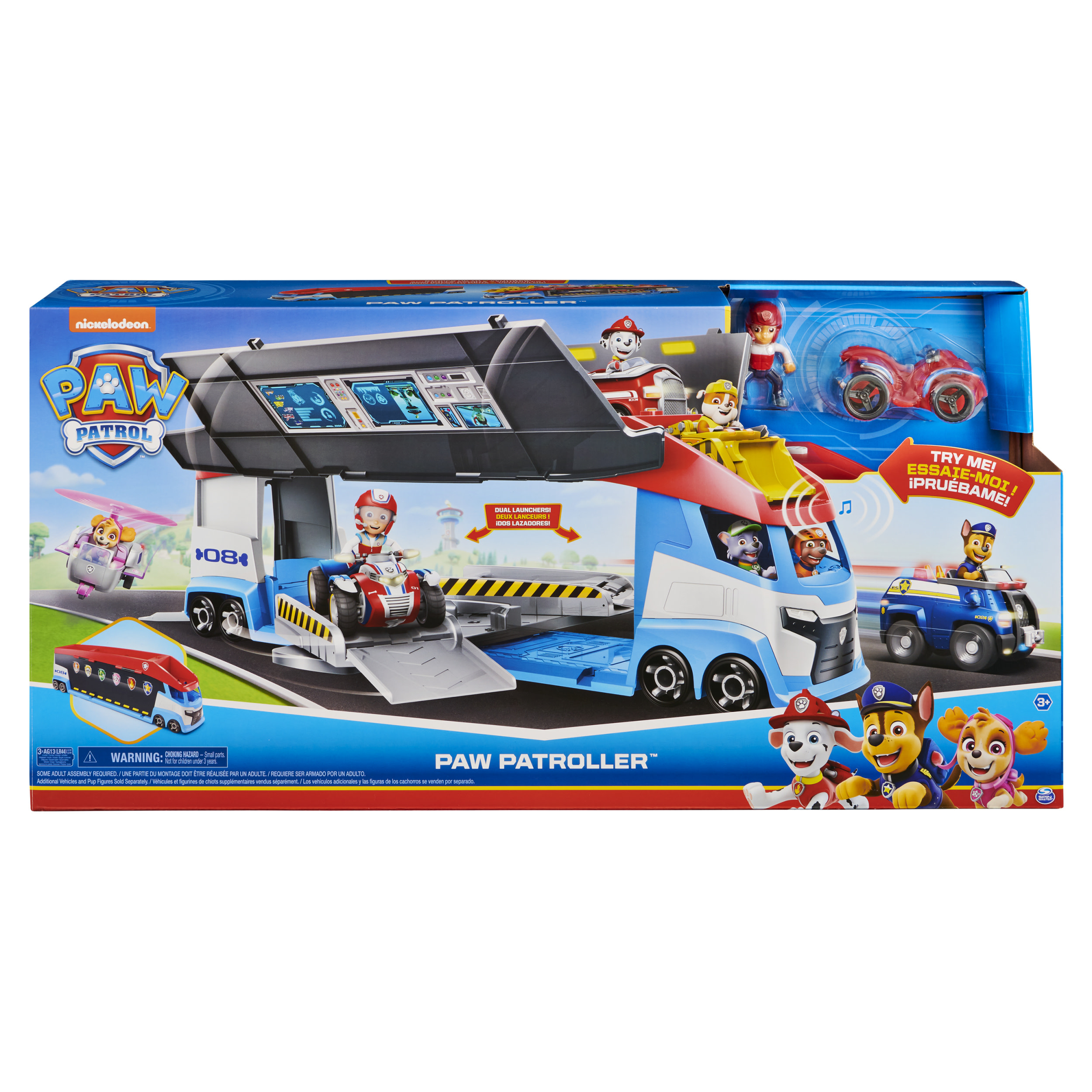 Ein Paw Patrol-Spielzeugset mit einem Truck, Figuren und Fahrzeugen auf einer blau-roten Schachtel.
