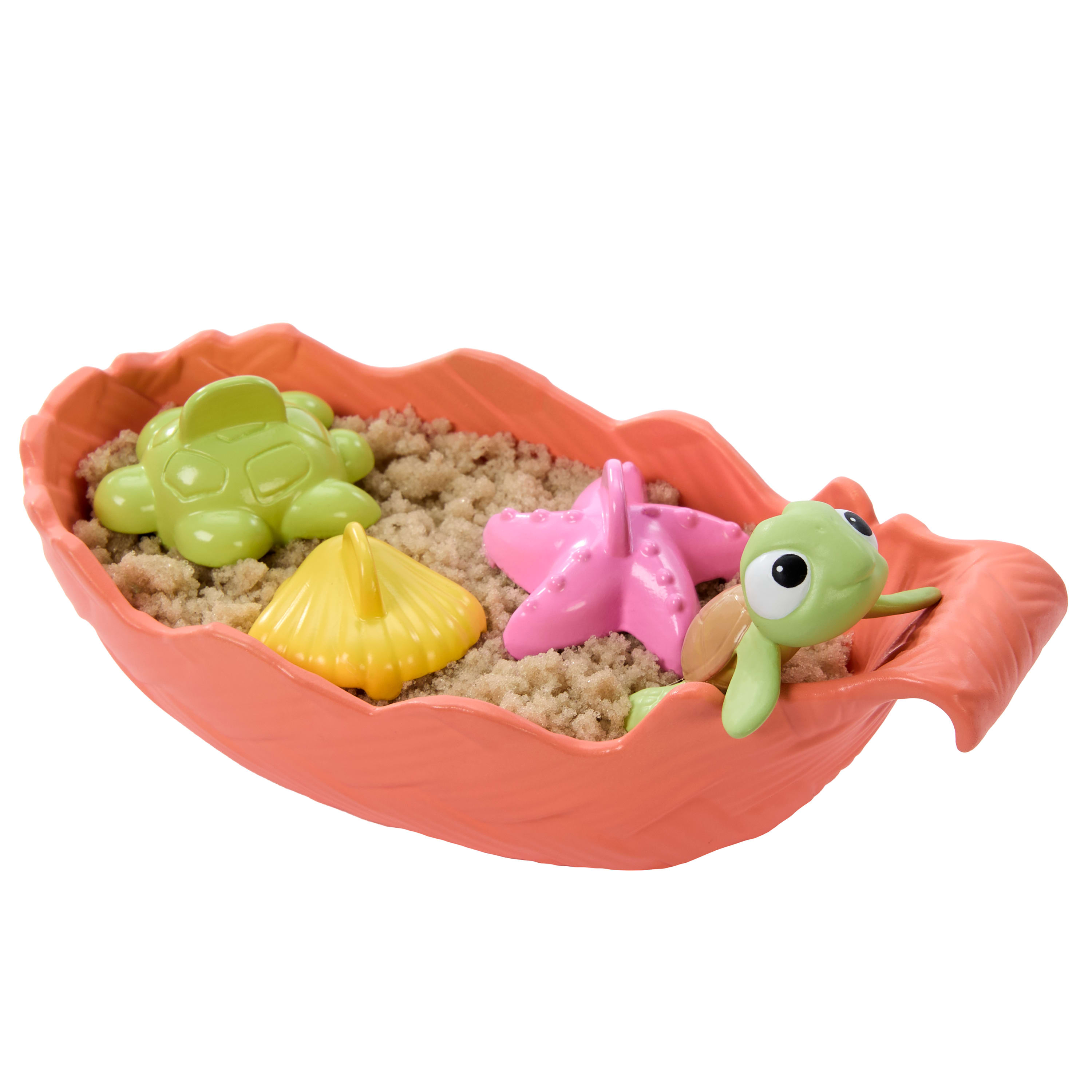 Pojemnik w kształcie liścia z piaskiem, zielonym żółwiem, żółtą muszlą, różową rozgwiazdą i figurką zielonego żółwia.