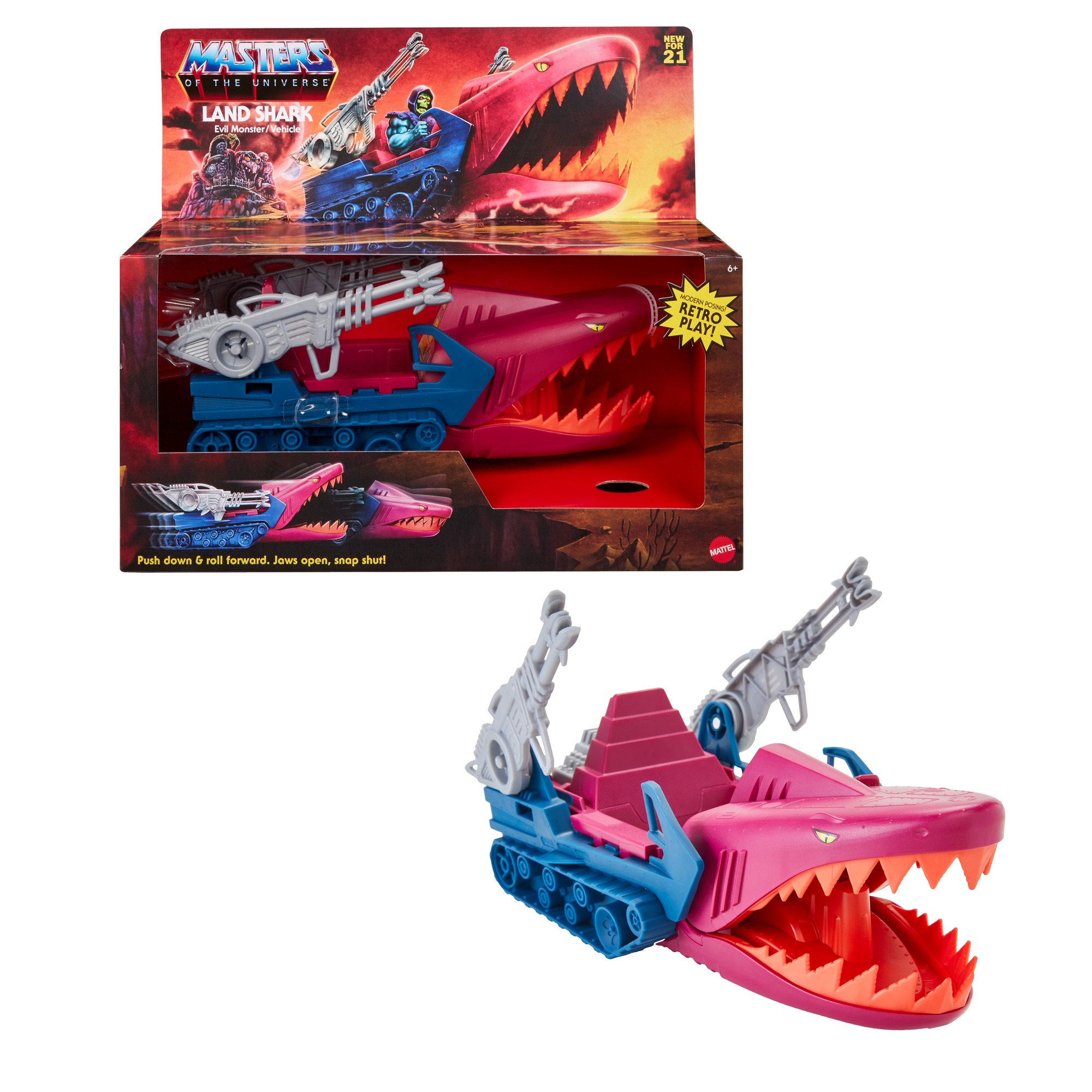 Un vehículo de juguete Land Shark con cabeza de tiburón rosa y orugas azules, en su embalaje.