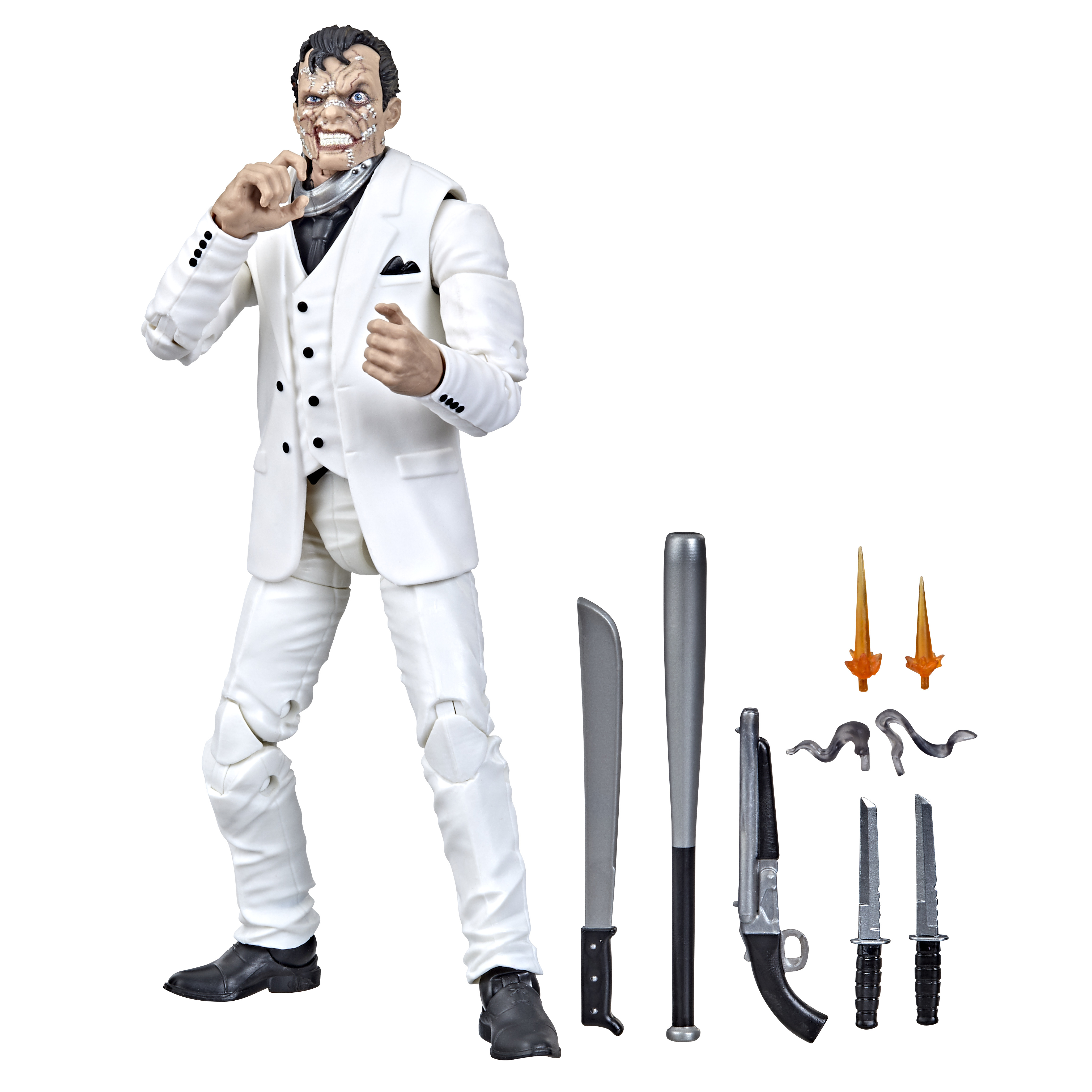 Figurka Two-Face w białym garniturze. Akcesoria: broń i efekty. Jedna strona twarzy jest oszpecona.