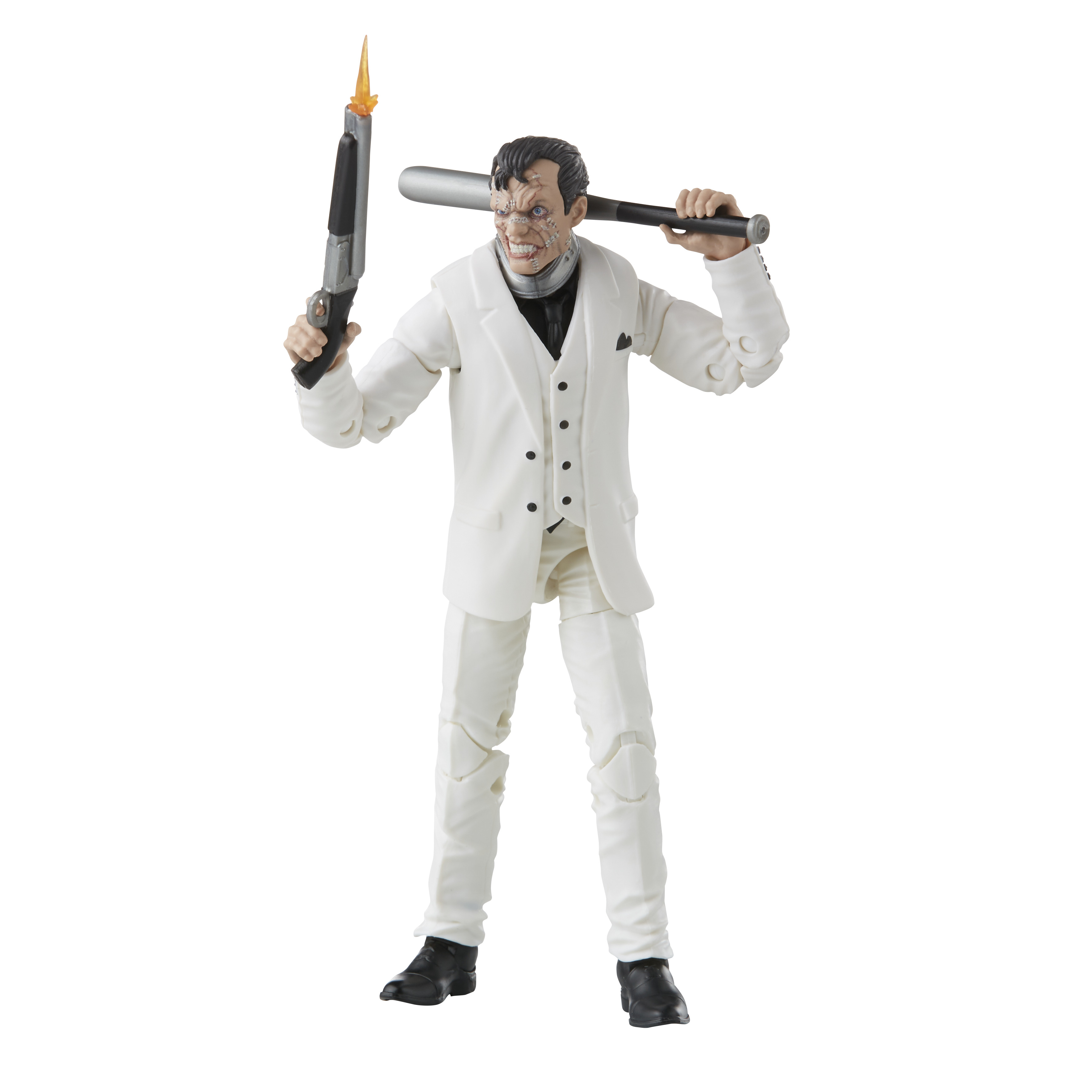 Postać w białym garniturze trzyma pistolet z płomieniem i kij. Jego twarz jest oszpecona.