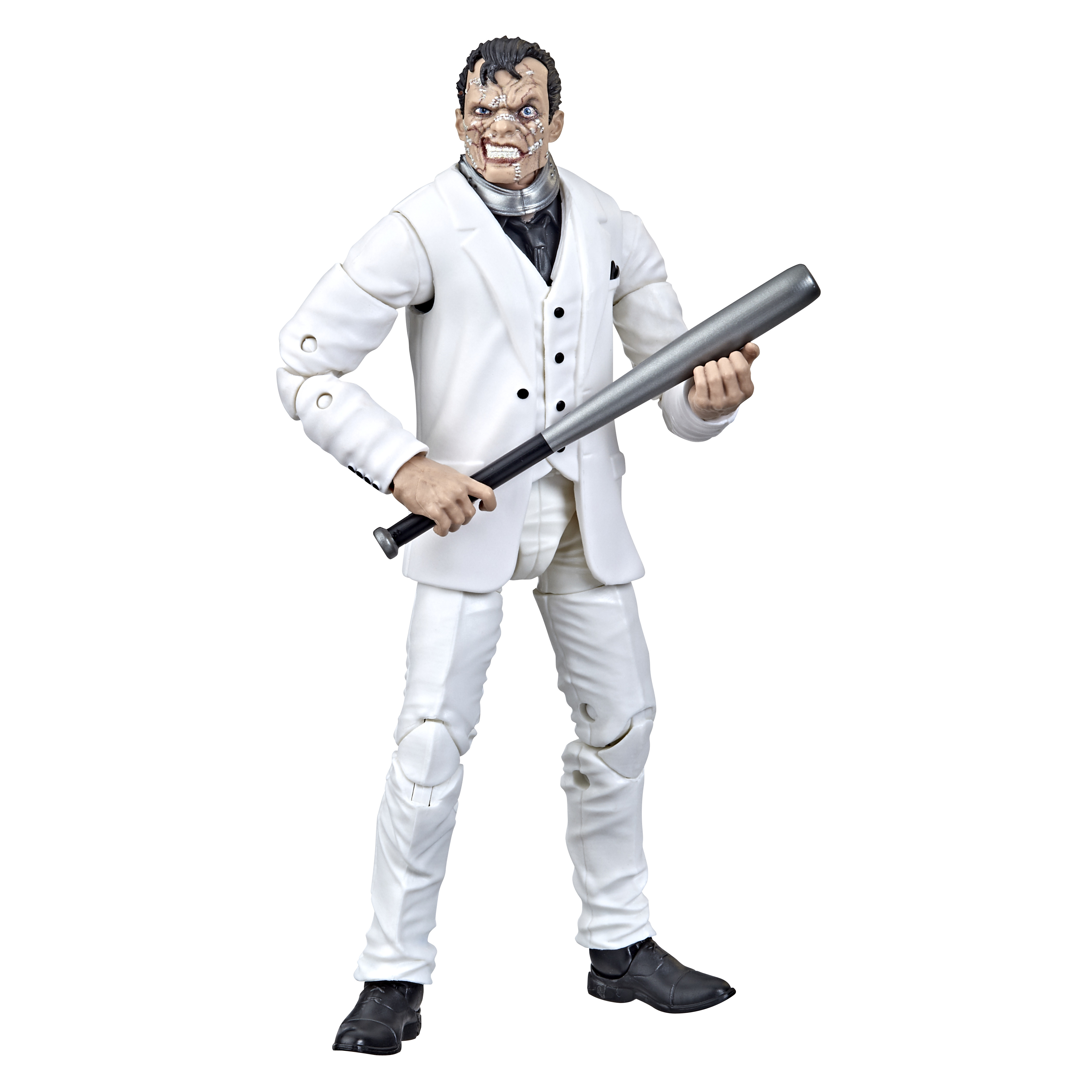 Figurka Two-Face w białym garniturze, trzymająca kij. Jedna strona jego twarzy jest oszpecona.