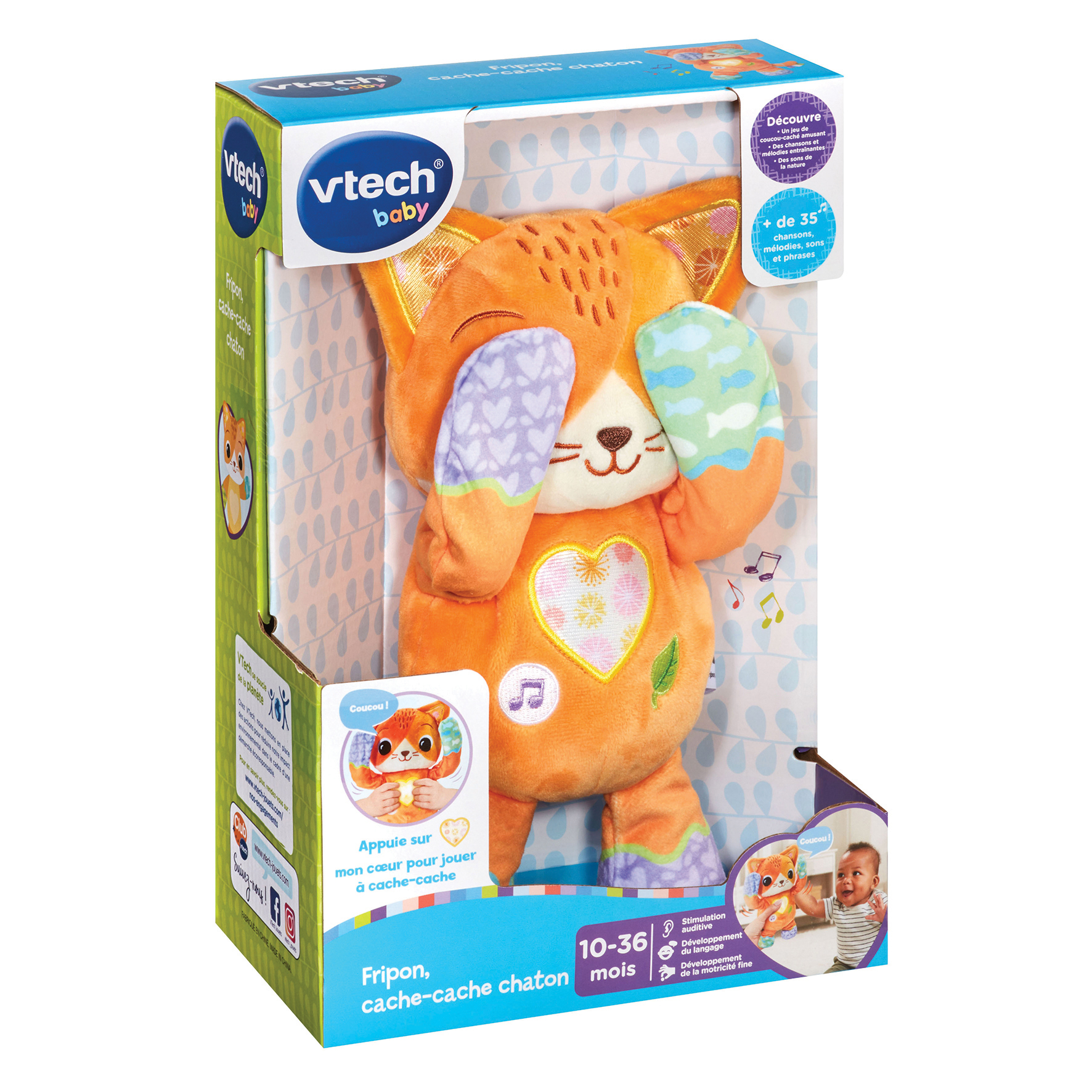 Pomarańczowa pluszowa zabawka w kształcie lisa w pudełku. Lis zakrywa oczy. Pudełko ma tekst i obrazy.