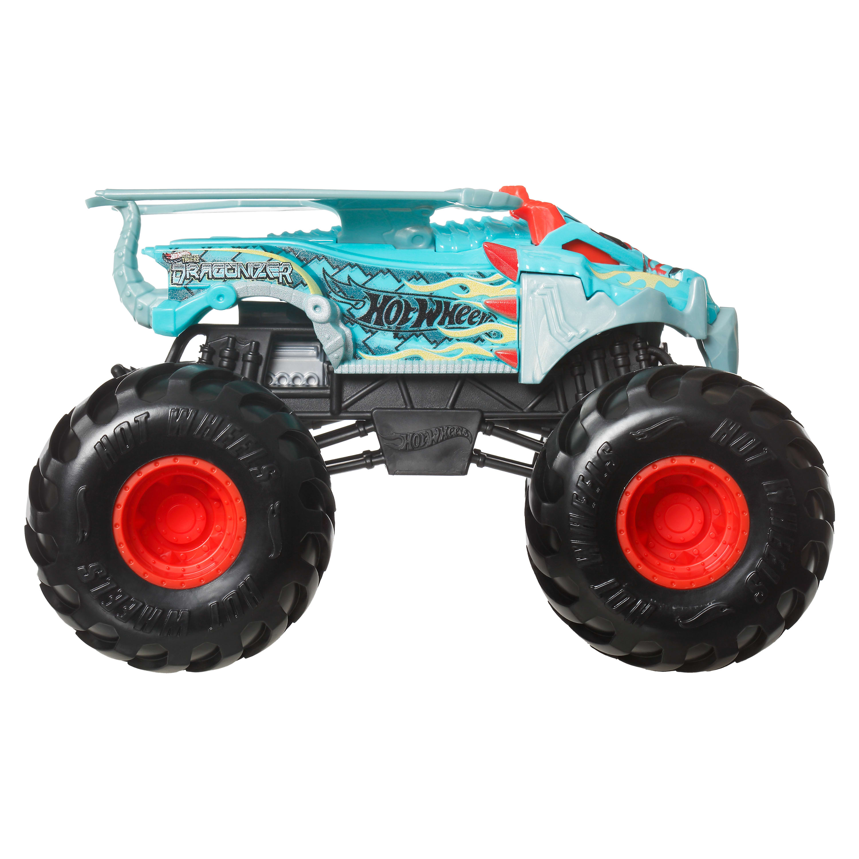 Ein blau-roter Hot Wheels Monstertruck. Er hat große schwarze Reifen mit roten Zentren. Der Truck befindet sich auf weißem Hintergrund.