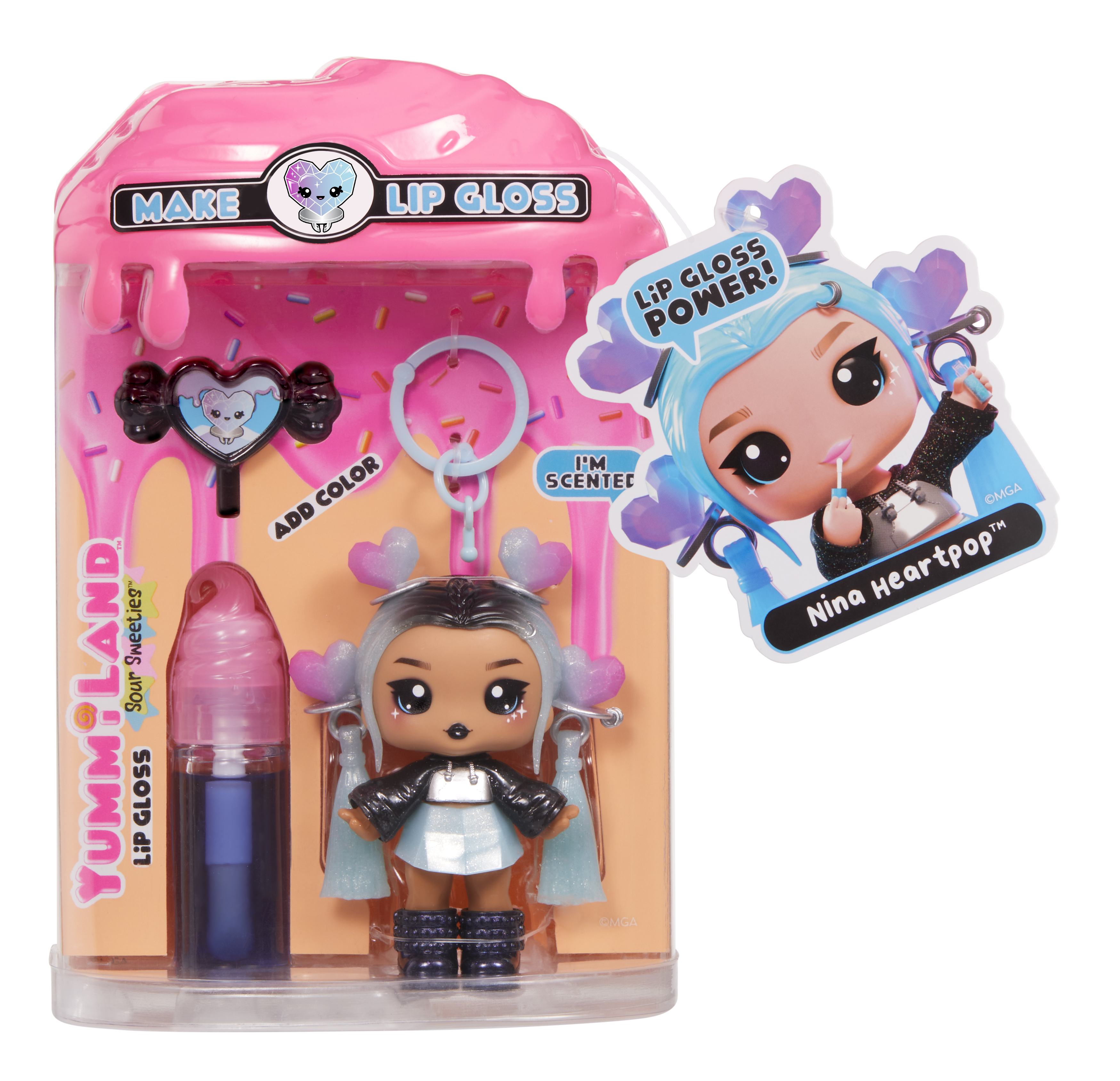 Ein Lipgloss-Set mit einer Puppe. Die Verpackung ist rosa und orange. Die Puppe hat blaue Haare und eine schwarze Jacke.