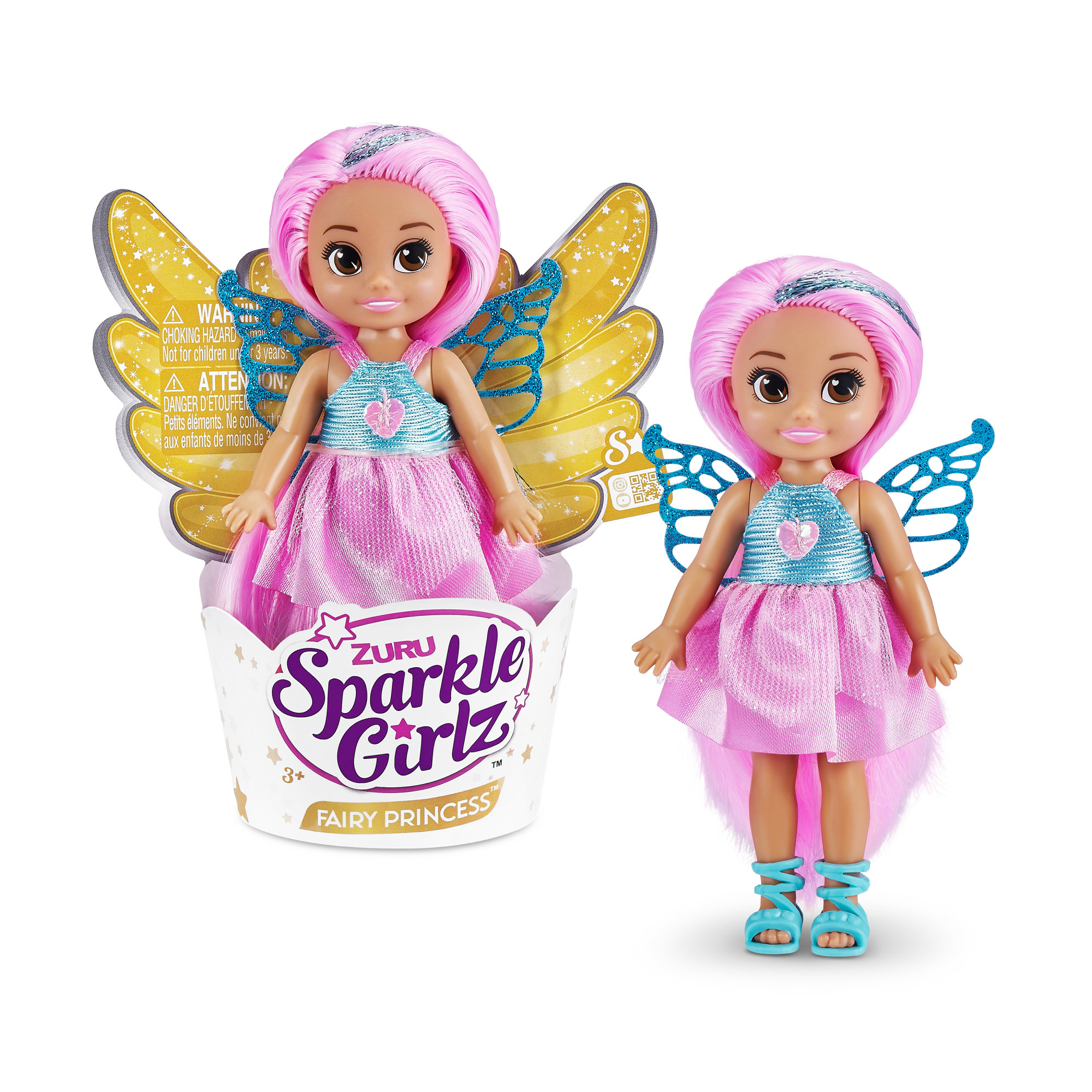 Zwei Feenpuppen mit rosa Haaren und Flügeln. Eine ist in einer Schachtel. Die andere steht allein. Beide haben rosa Kleider und blaue Akzente.