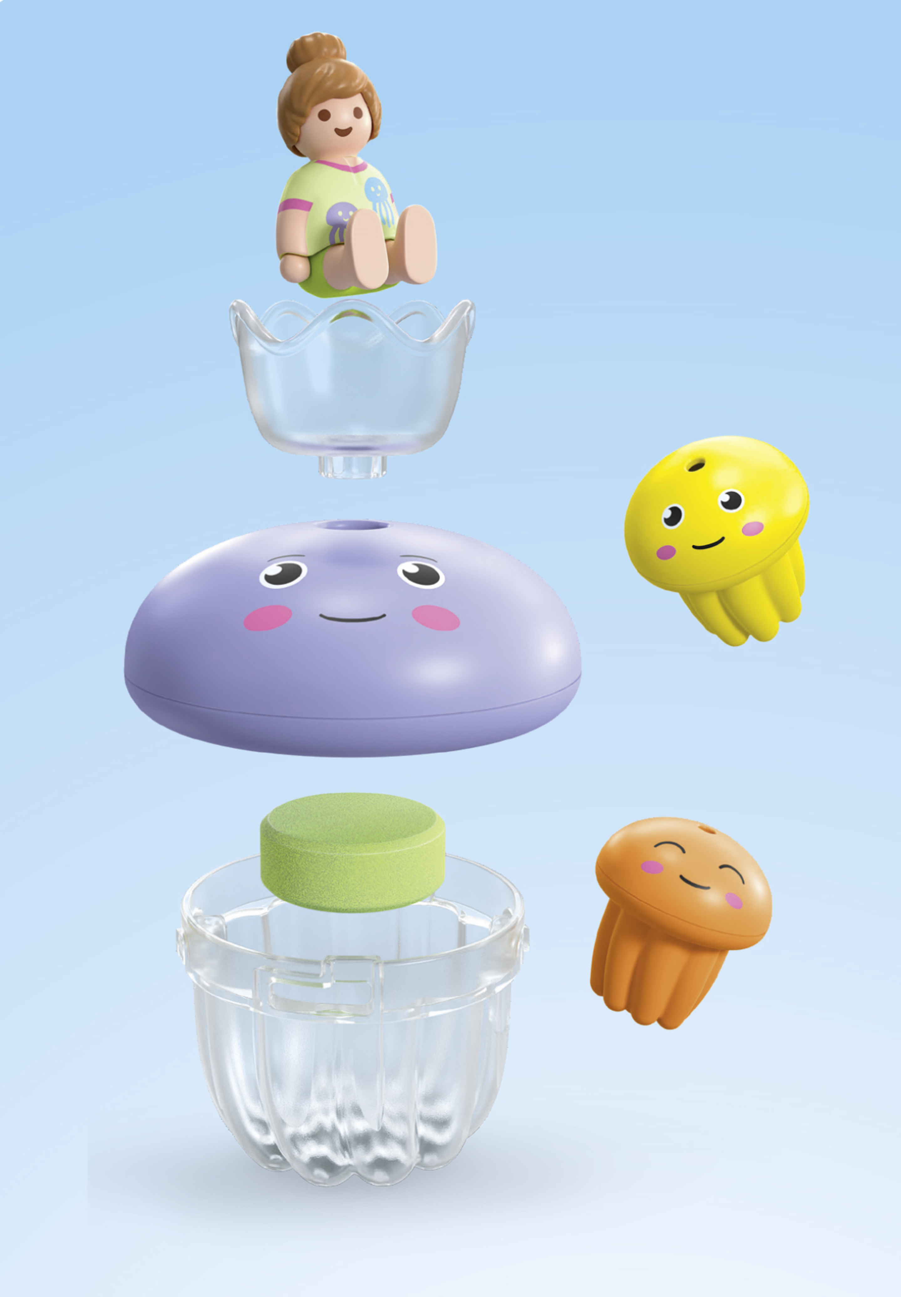 Zestaw zabawek z lalką, fioletową twarzą, dwiema meduzami i pojemnikiem na niebieskim tle.