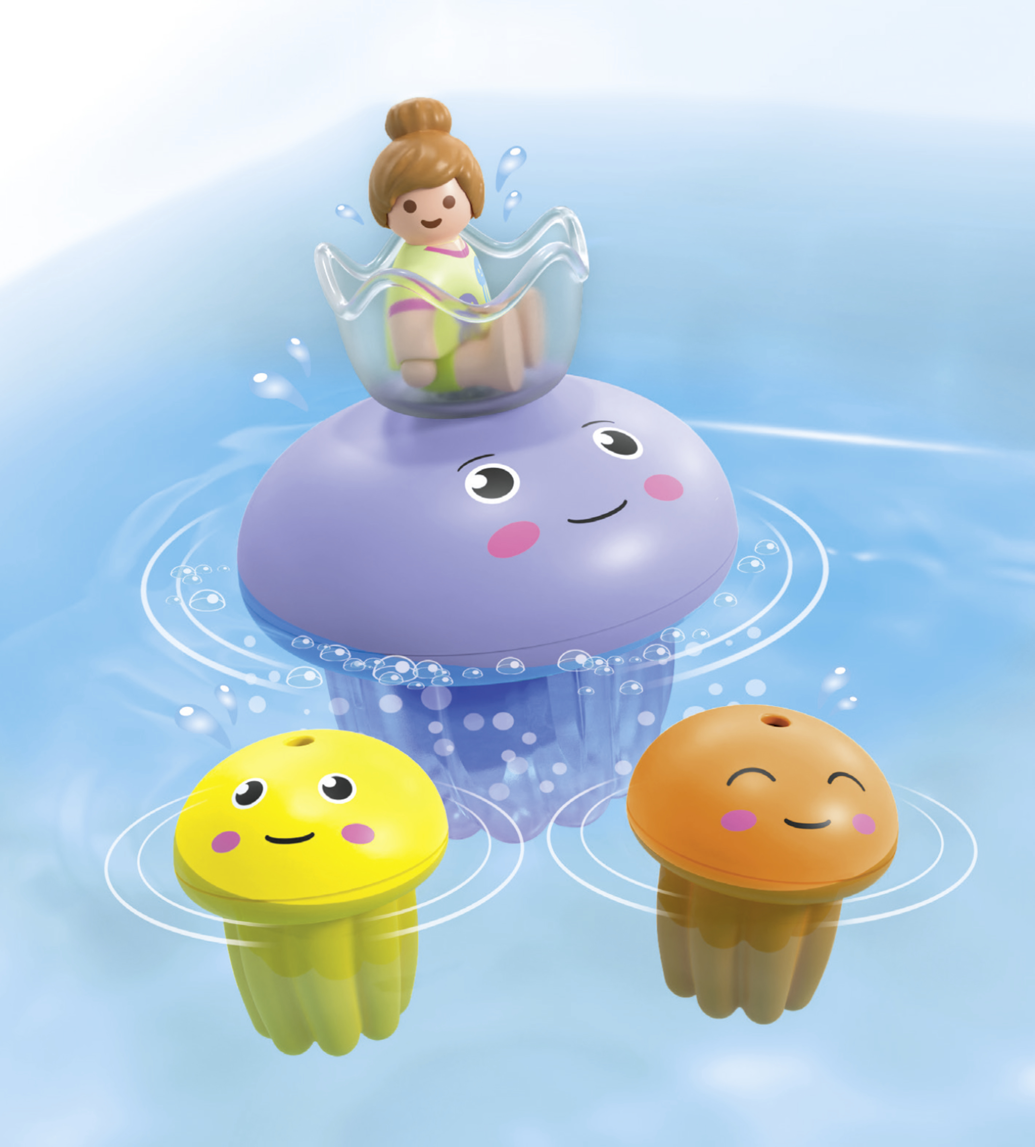 Scena z zabawkami w wodzie. Lalka siedzi w przezroczystym kubku na fioletowej meduzie. Dwie inne meduzy pływają.