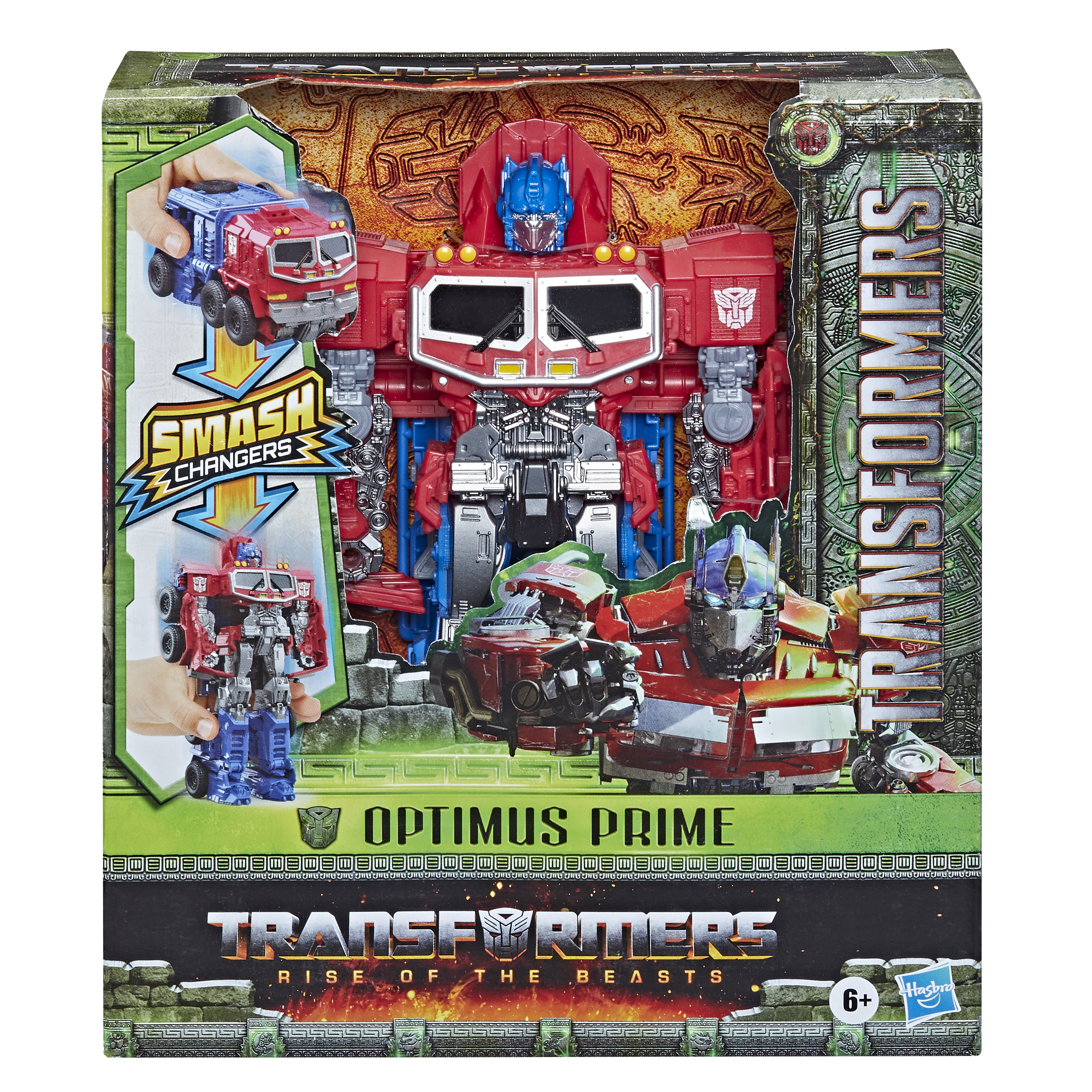 Zabawka Optimus Prime w pudełku. Zabawka jest czerwona i niebieska, z logo Transformers.