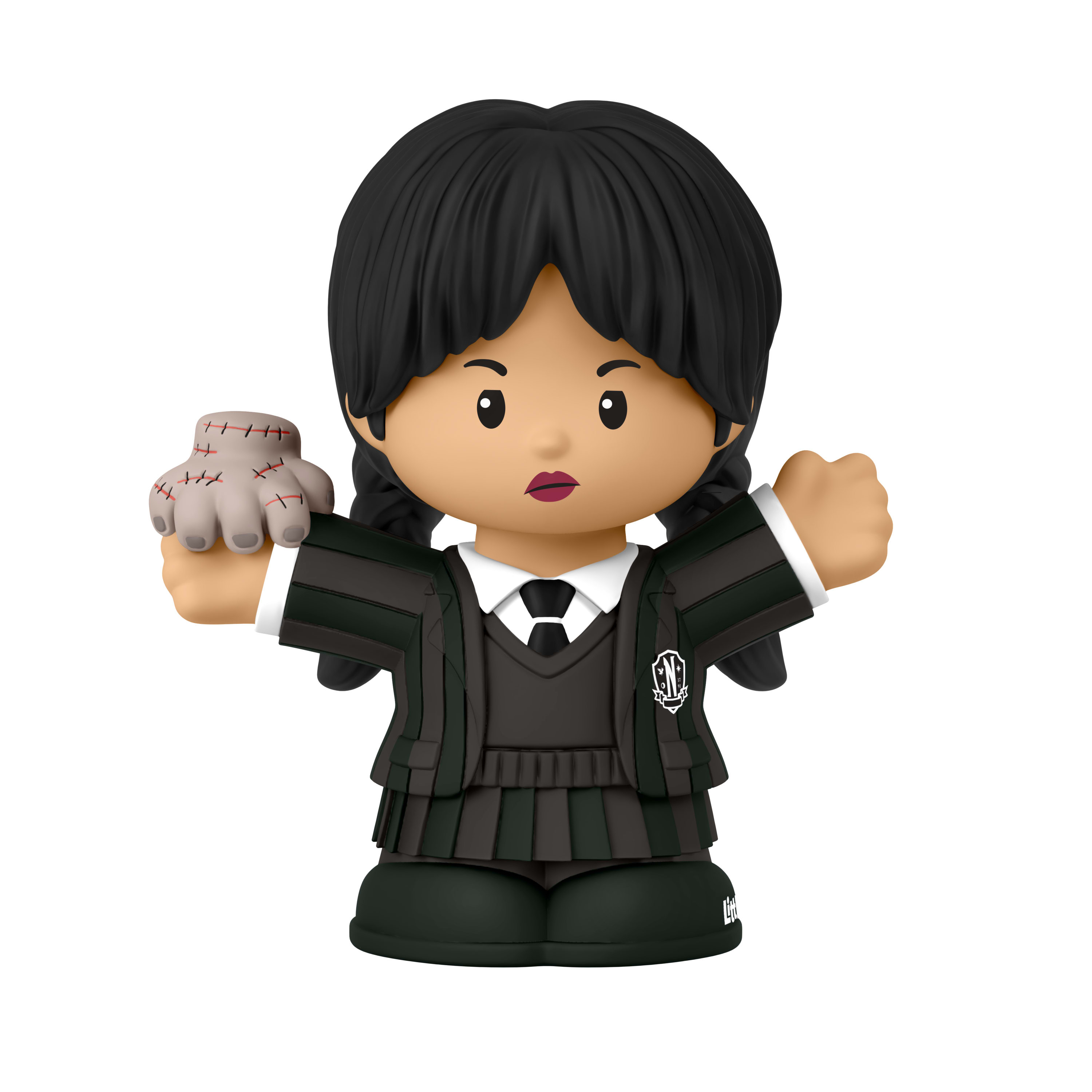 Figur von Wednesday Addams. Sie trägt eine schwarze Uniform und hat schwarze Haare. Ihre Hand ist genäht.