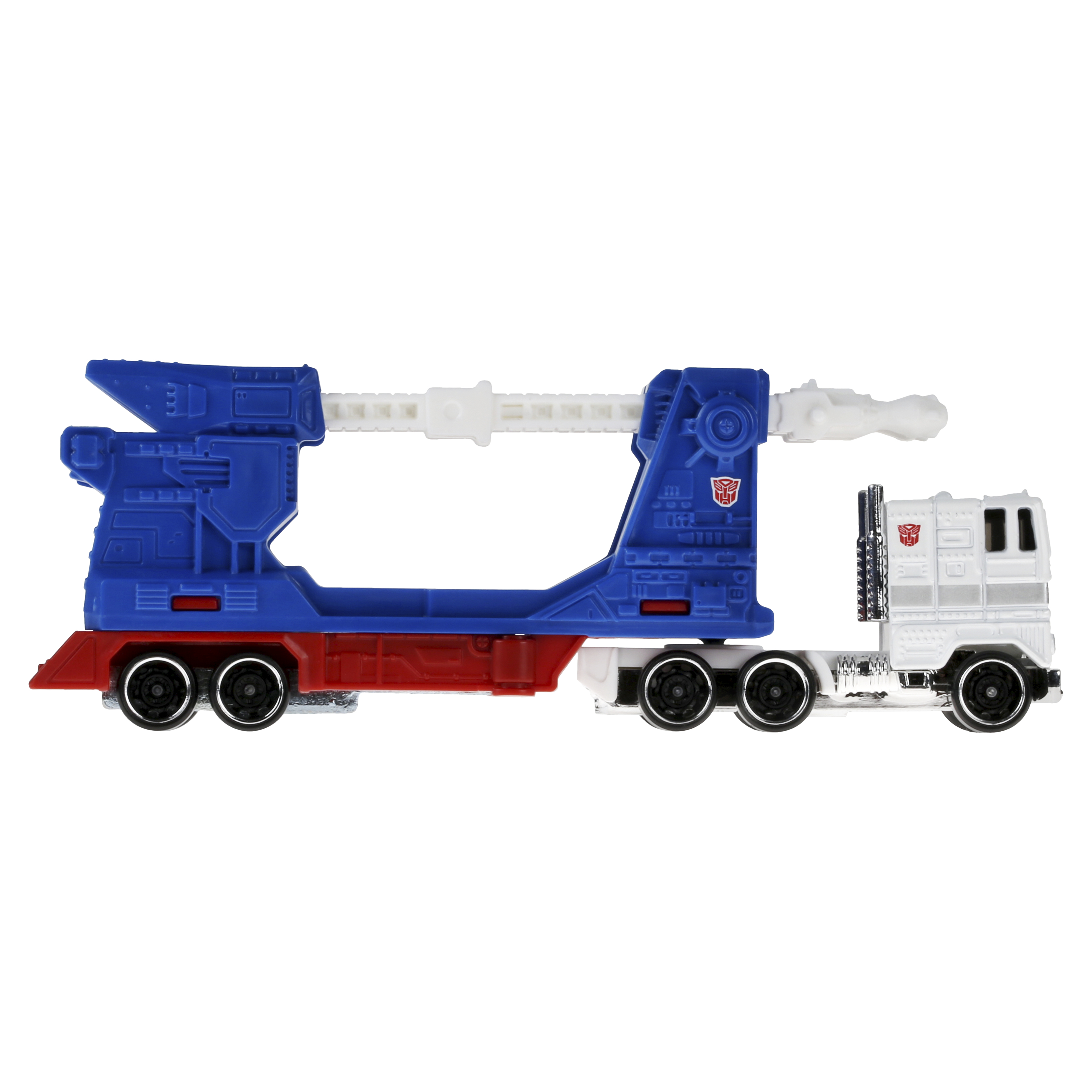 Zabawkowa ciężarówka z niebieską i czerwoną przyczepą oraz białą kabiną. Przyczepa ma białą belkę.