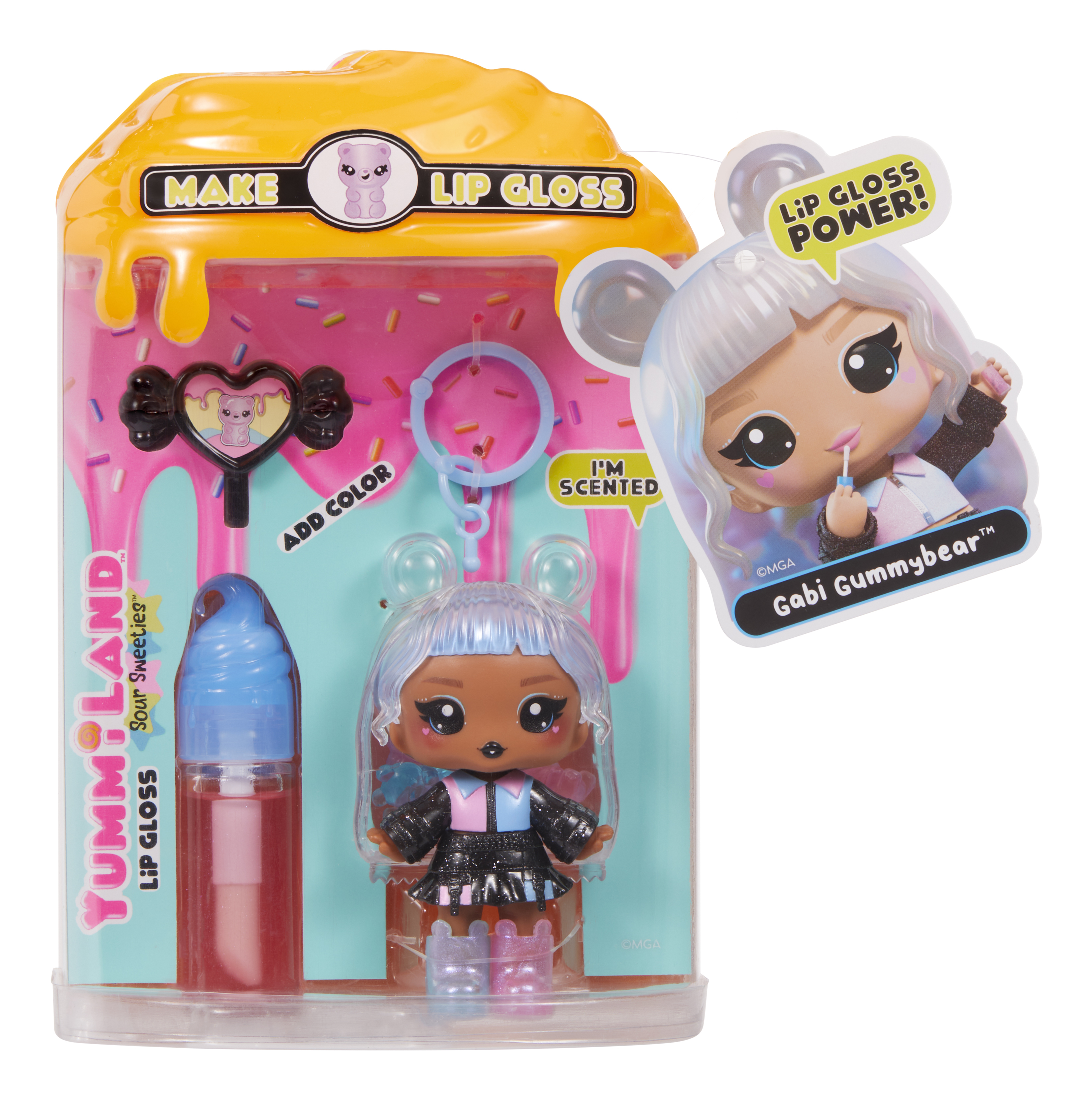 Ein Lipgloss-Set mit einer Puppe. Die Verpackung hat einen gelben Deckel, einen rosa Hintergrund und eine Gabi Gummybear-Puppe.