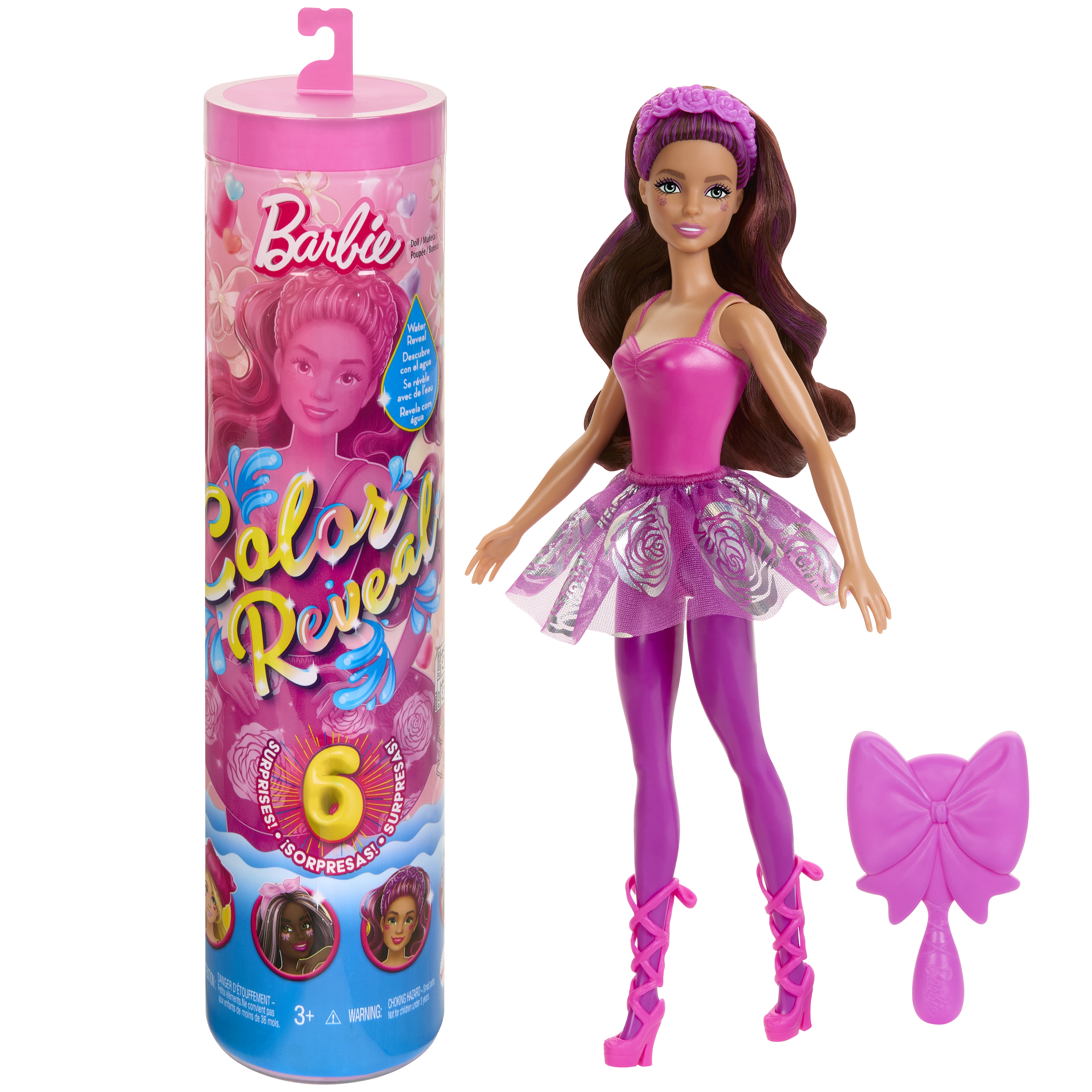Muñeca Barbie con atuendo morado, lazo y embalaje cilíndrico. El embalaje dice 'Color Reveal'.