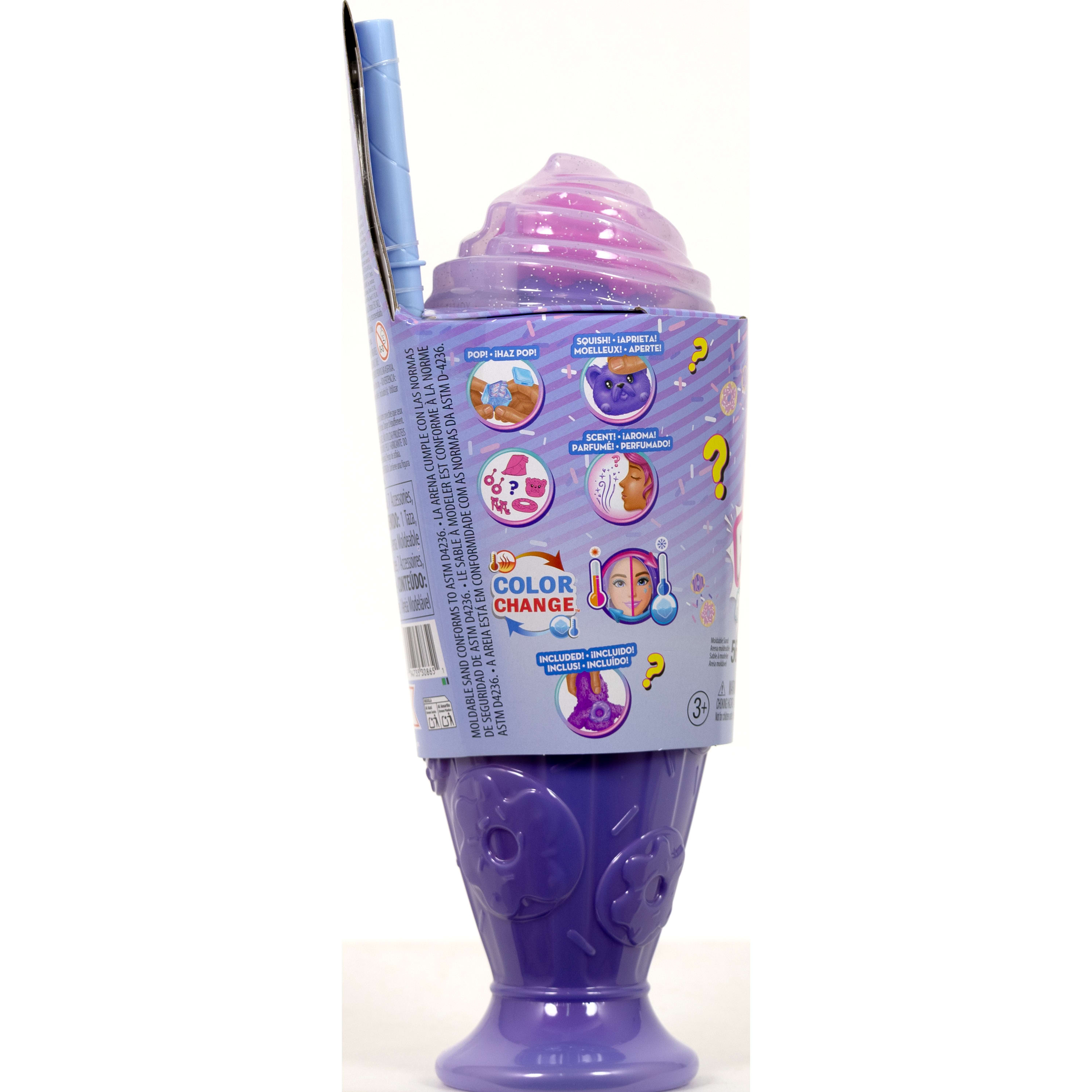 Opakowanie zabawki w kształcie loda, fioletowe i różowe. Ma tekst i grafikę, w tym słowa 'color change'.