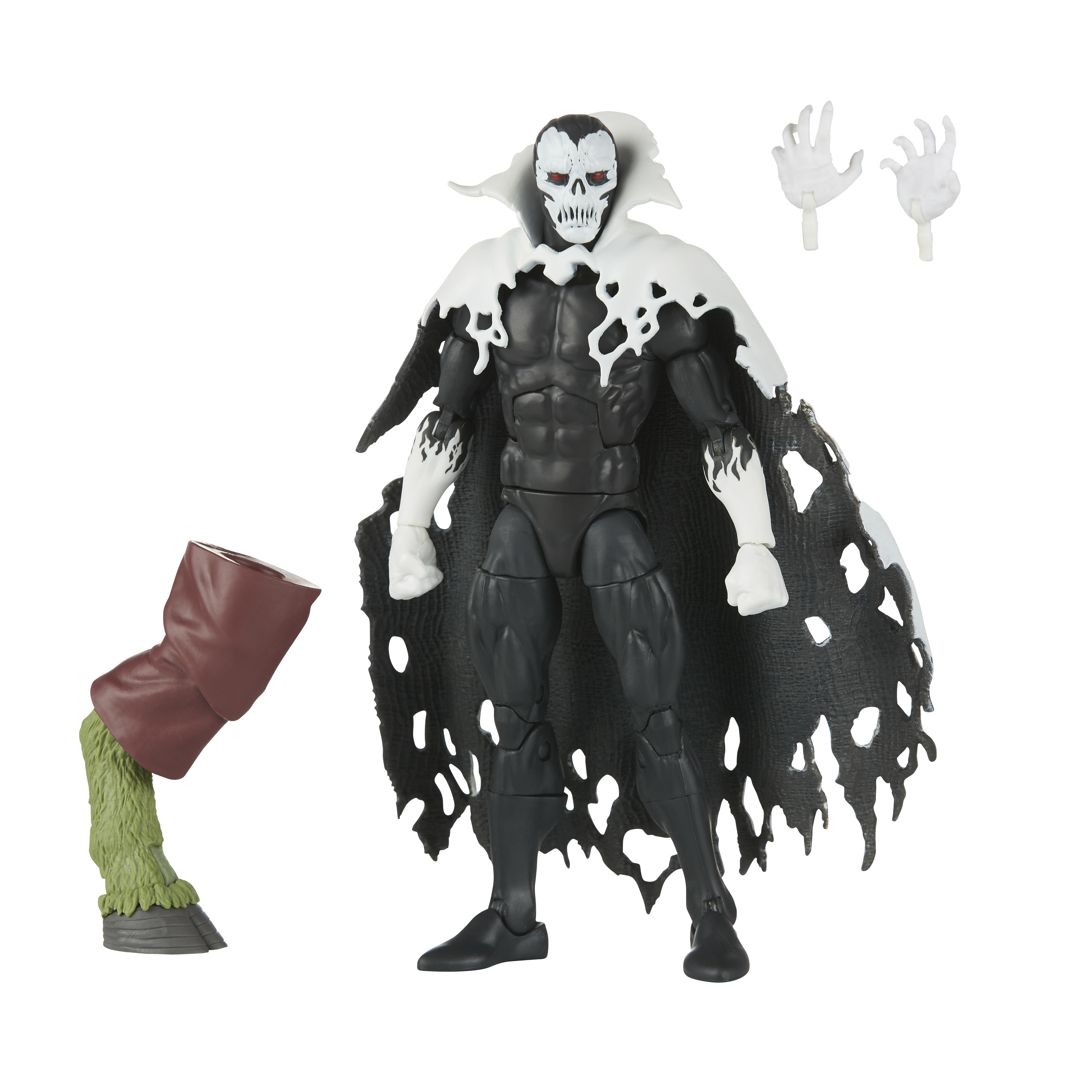 Un action figure in bianco e nero con un teschio. Parti di una gamba marrone e zoccolo verde sono staccate.