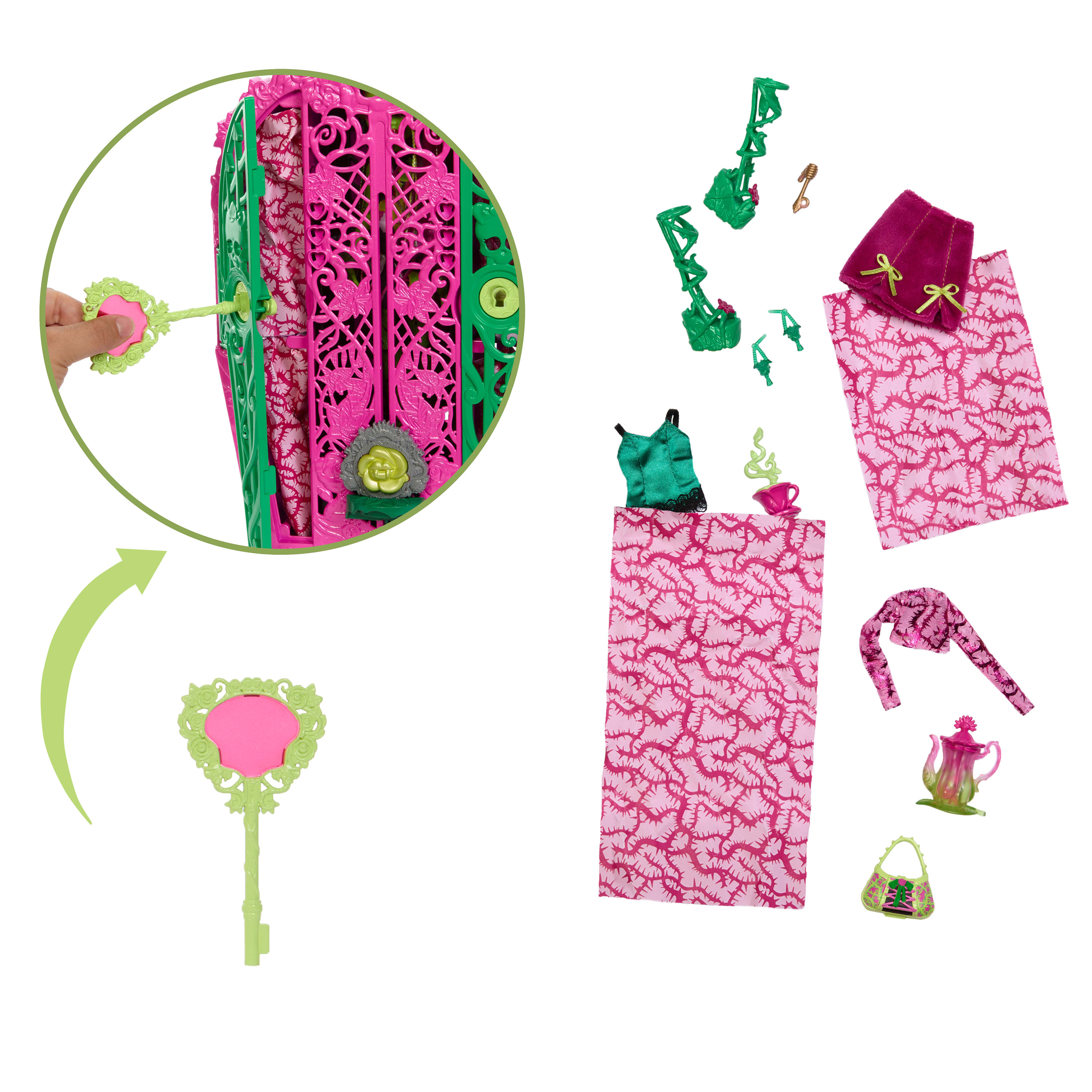 Zestaw zabawek z zielono-różowym pudełkiem w kształcie książki, kluczem, ubraniami i akcesoriami, na białym tle.