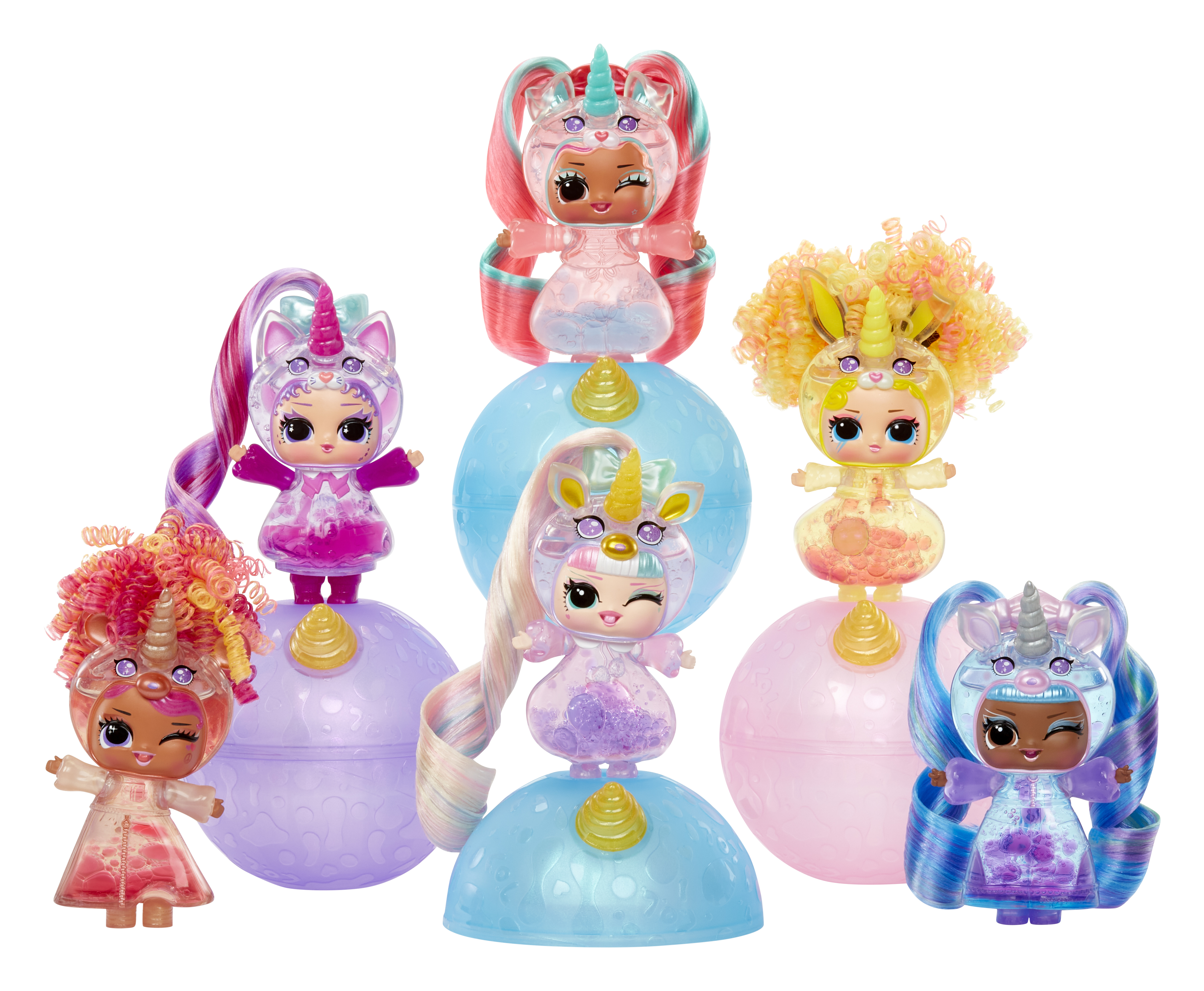 Siete muñecas con temática de unicornio en diferentes colores. Cada muñeca está sobre una base, con una concha transparente y pelo colorido.