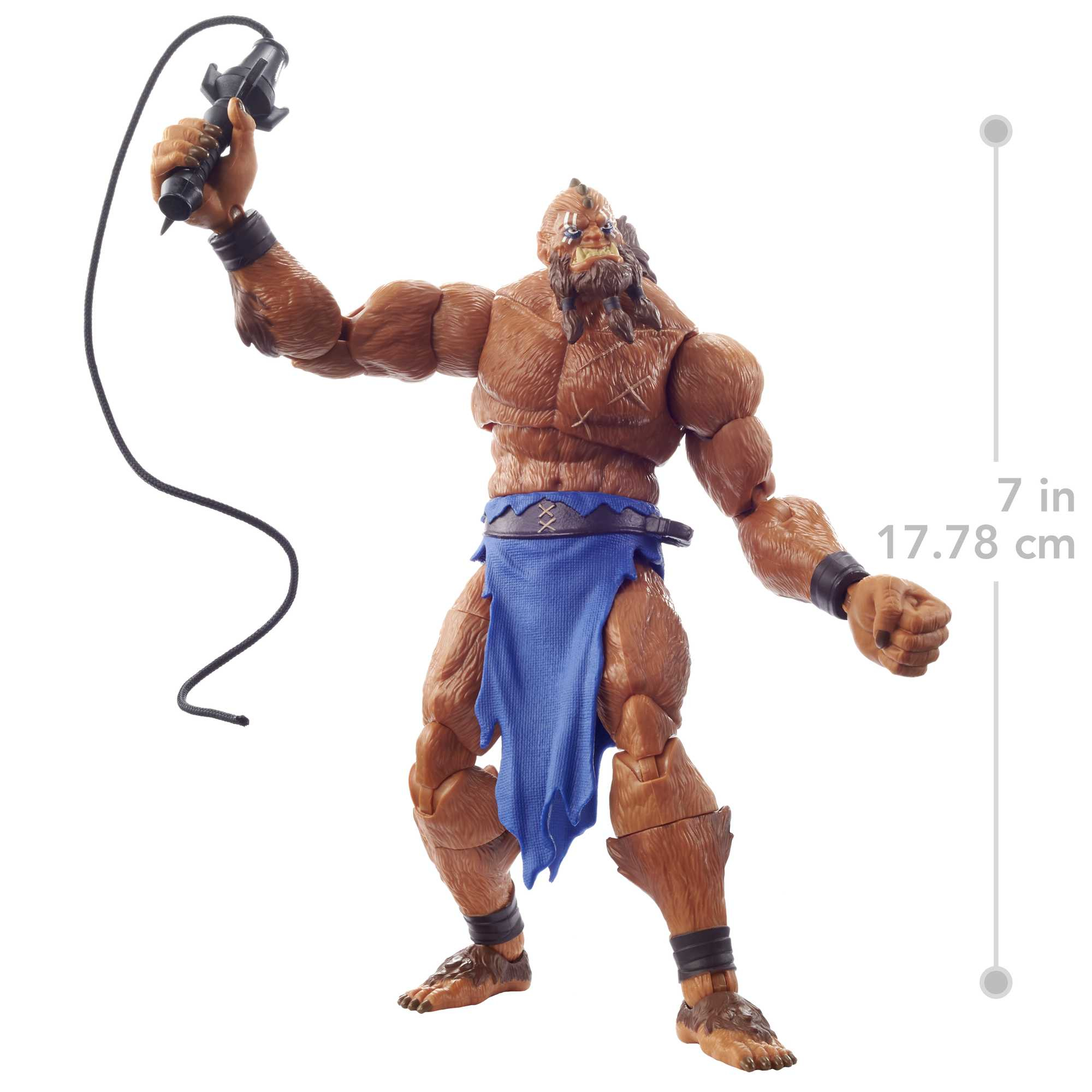 Eine braune, muskulöse Actionfigur hält eine schwarze Peitsche. Sie trägt einen blauen Lendenschurz. Eine Skala zeigt 7 Zoll.