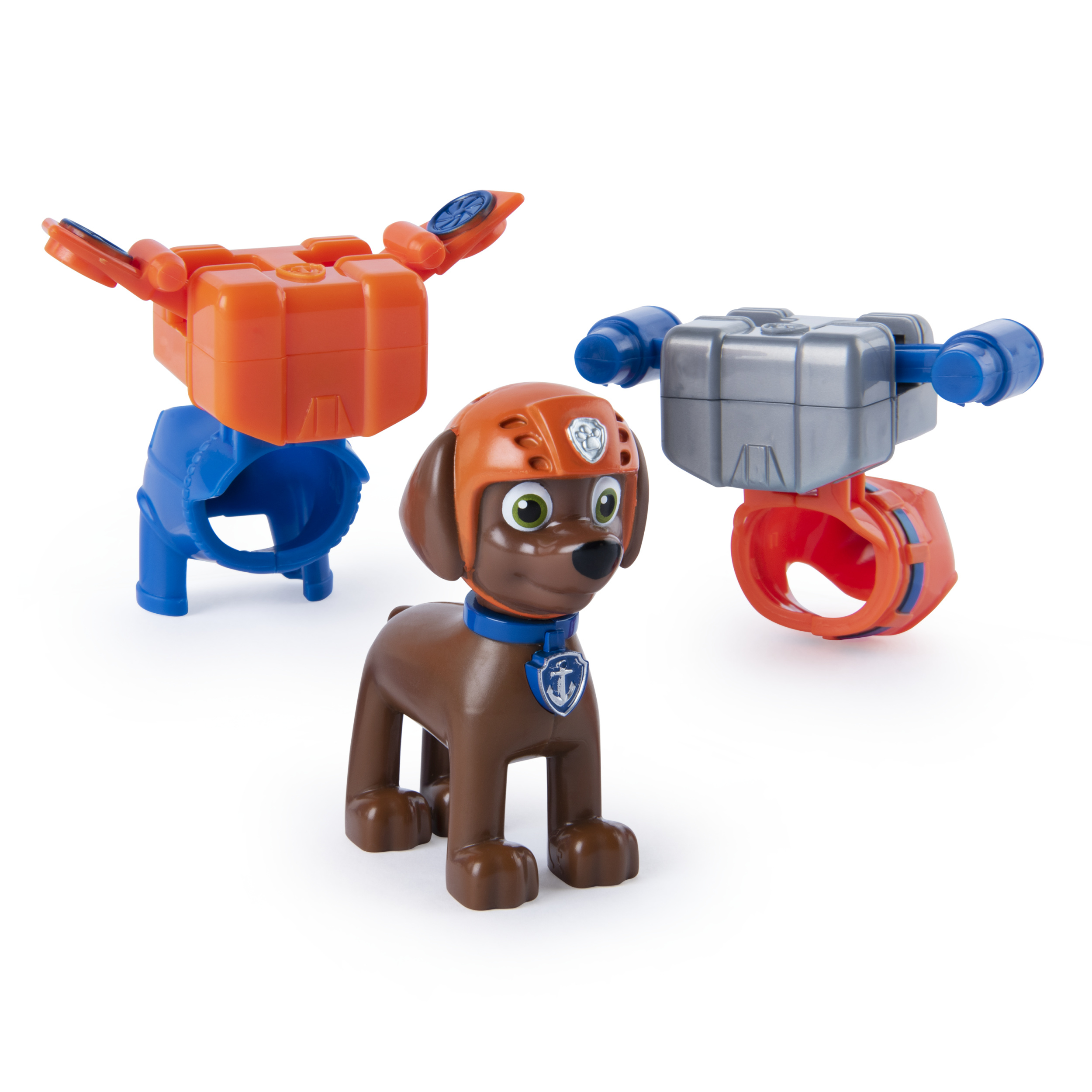 Un juguete de perro marrón con un casco naranja, con dos juegos de accesorios de juguete en naranja, azul y plateado.