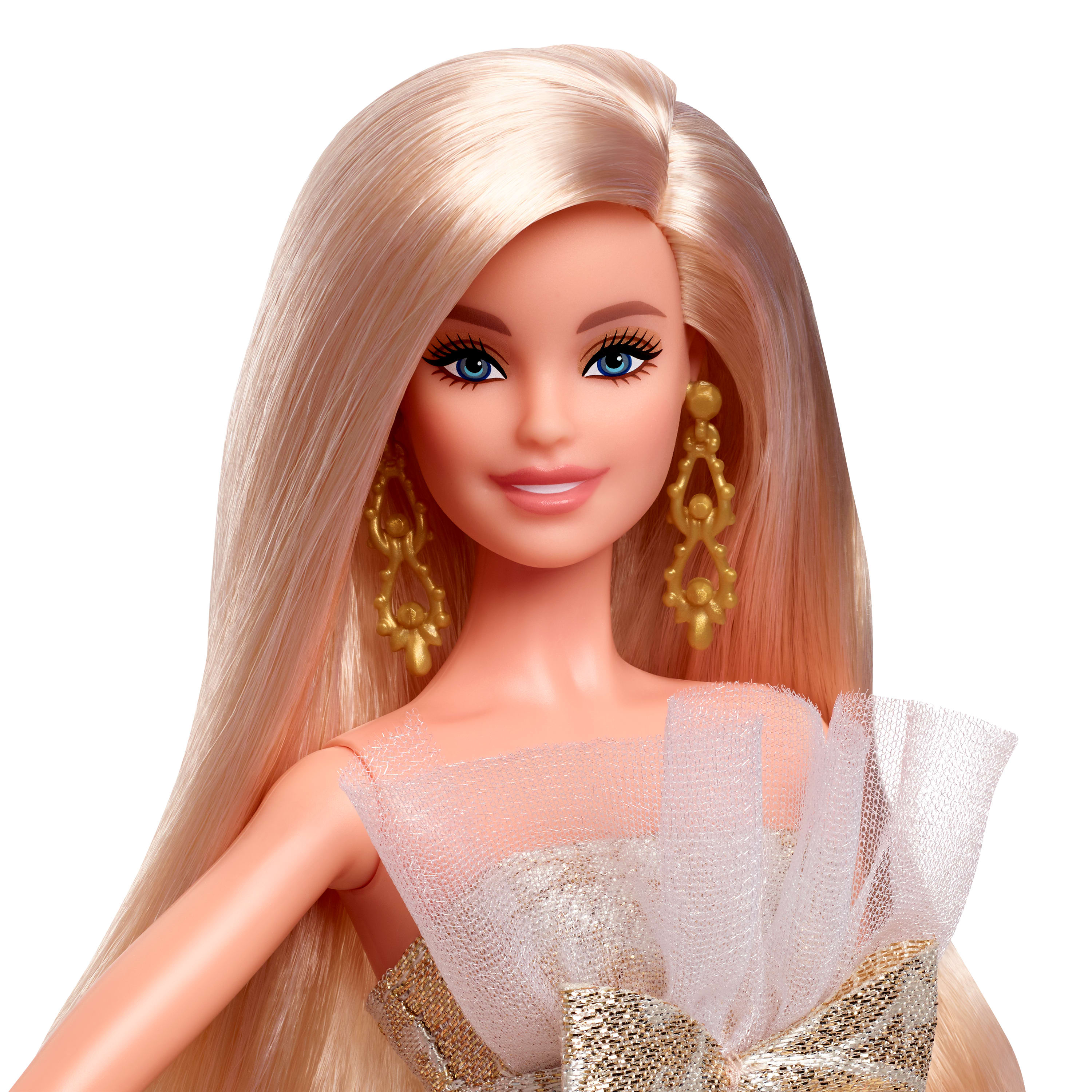 Eine Barbie-Puppe mit langem blonden Haar, blauen Augen und goldenen Ohrringen. Sie trägt ein weißes und goldenes Kleid.