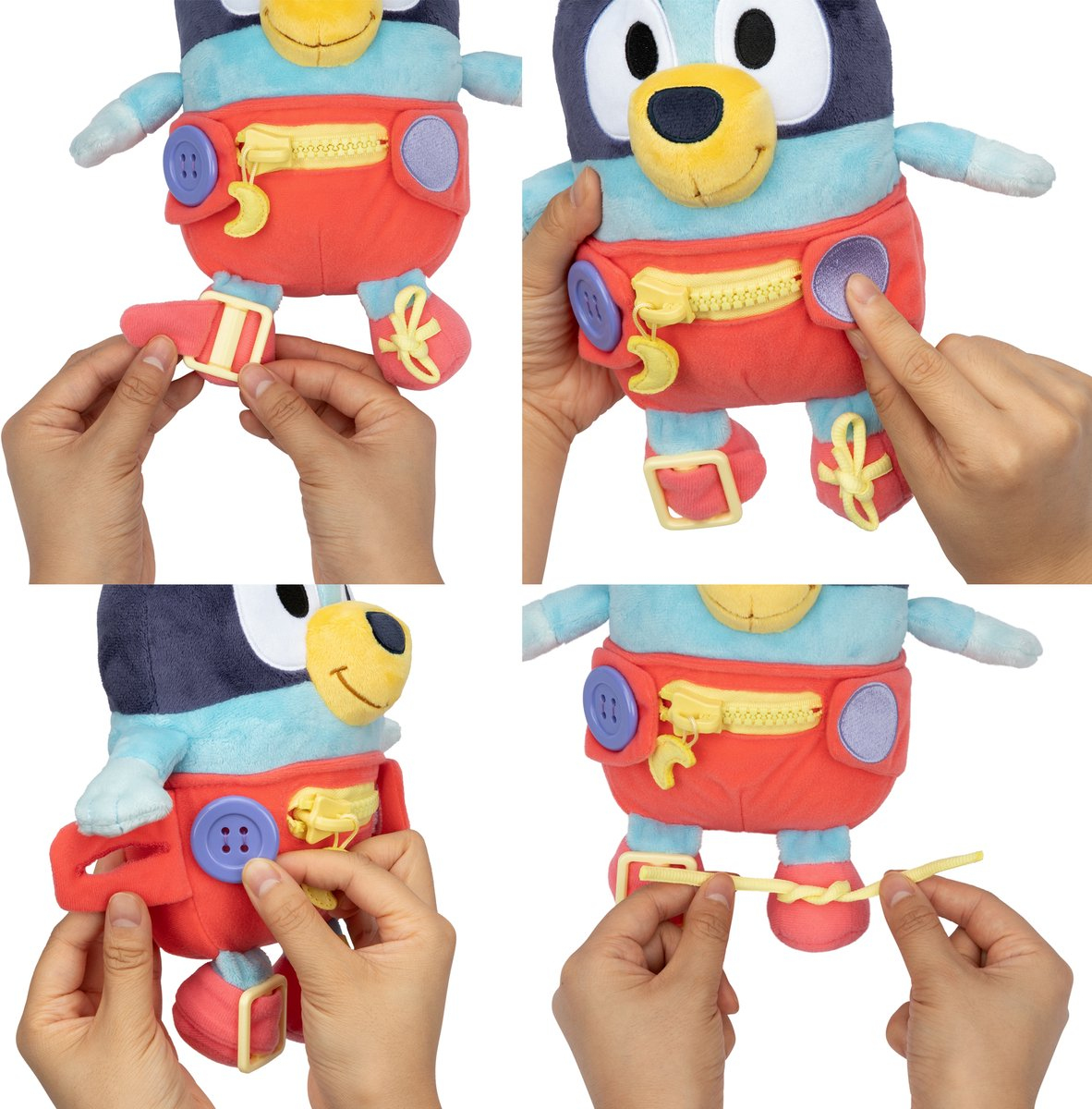 Un chien en peluche avec une tête bleue, un pantalon rouge et une fermeture éclair et des boutons jaunes. Les mains interagissent avec les caractéristiques du jouet.