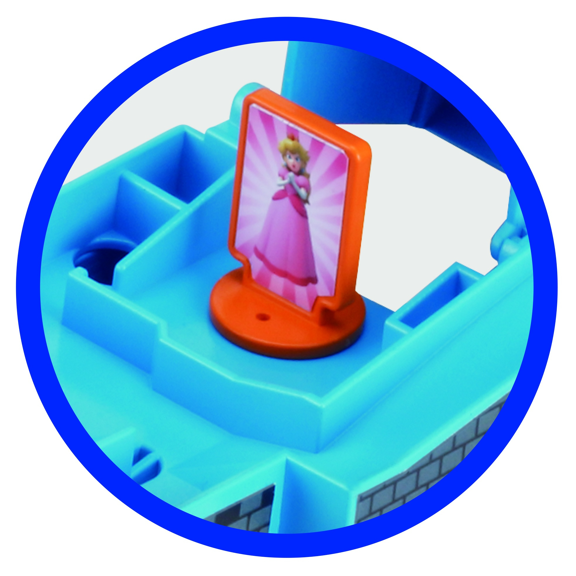 Zabawka z wizerunkiem Księżniczki Peach. Jest na niebieskiej konstrukcji, obwiedzionej niebieskim kolorem z białym tłem.