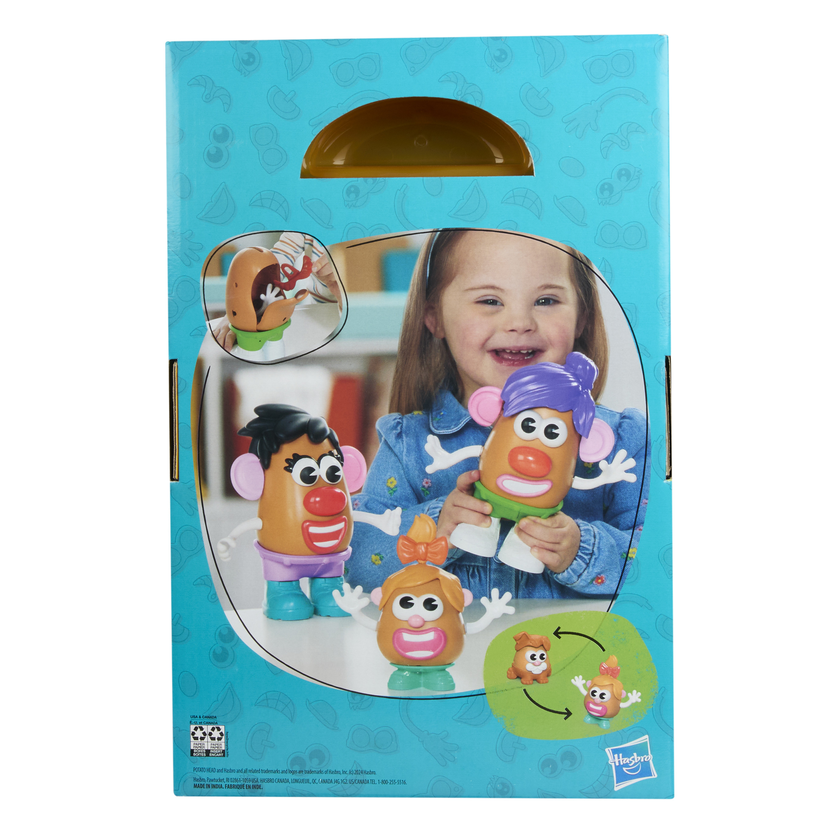 La caja muestra juguetes de Mr. Potato. Una niña sonríe sosteniendo uno, otras figuras de juguete están en la caja.