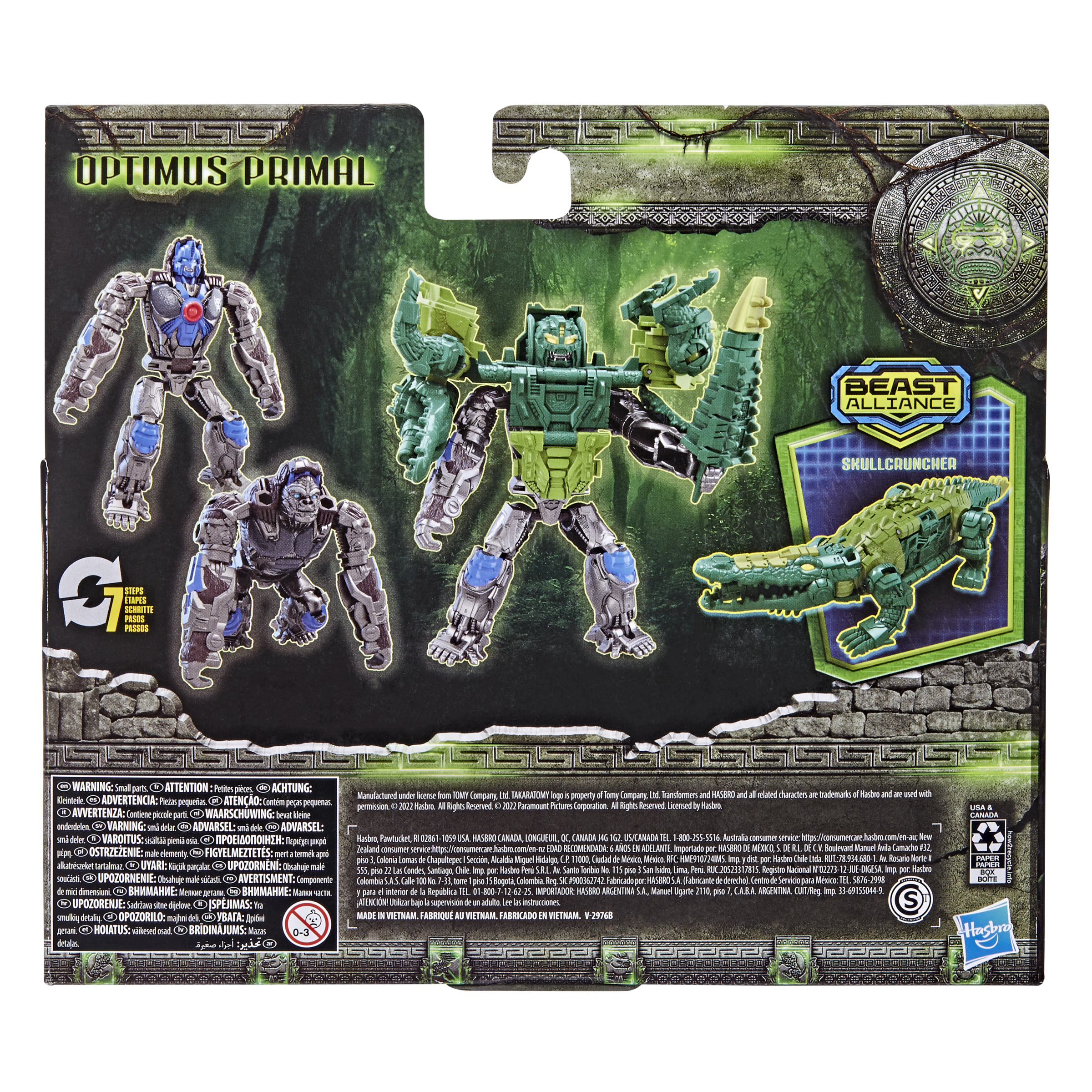 Confezione di cartone con personaggi giocattolo Optimus Primal, un coccodrillo verde e testo.