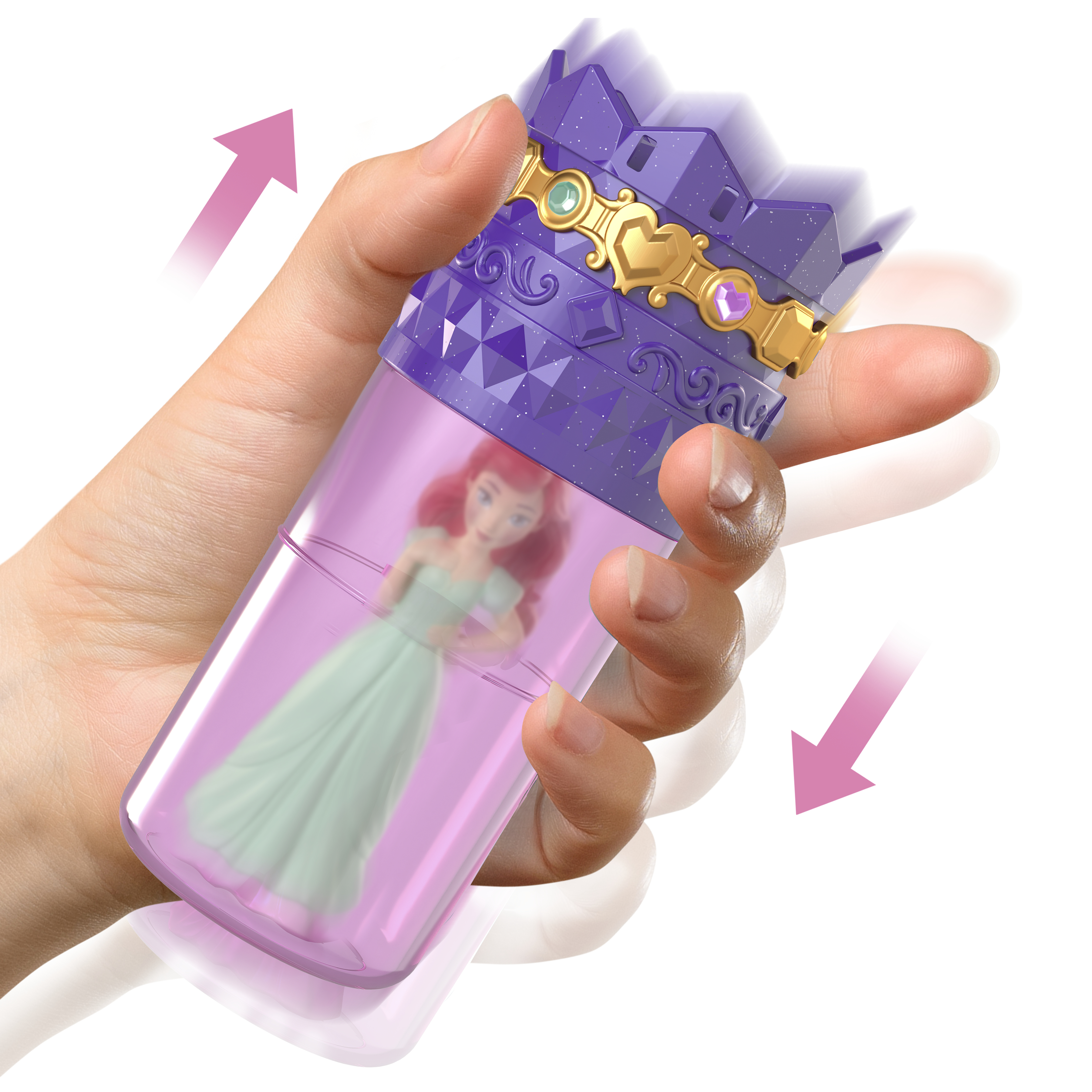 Eine Hand hält ein lila Spielzeug mit einer Prinzessin darin. Rosa Pfeile zeigen Bewegung an.