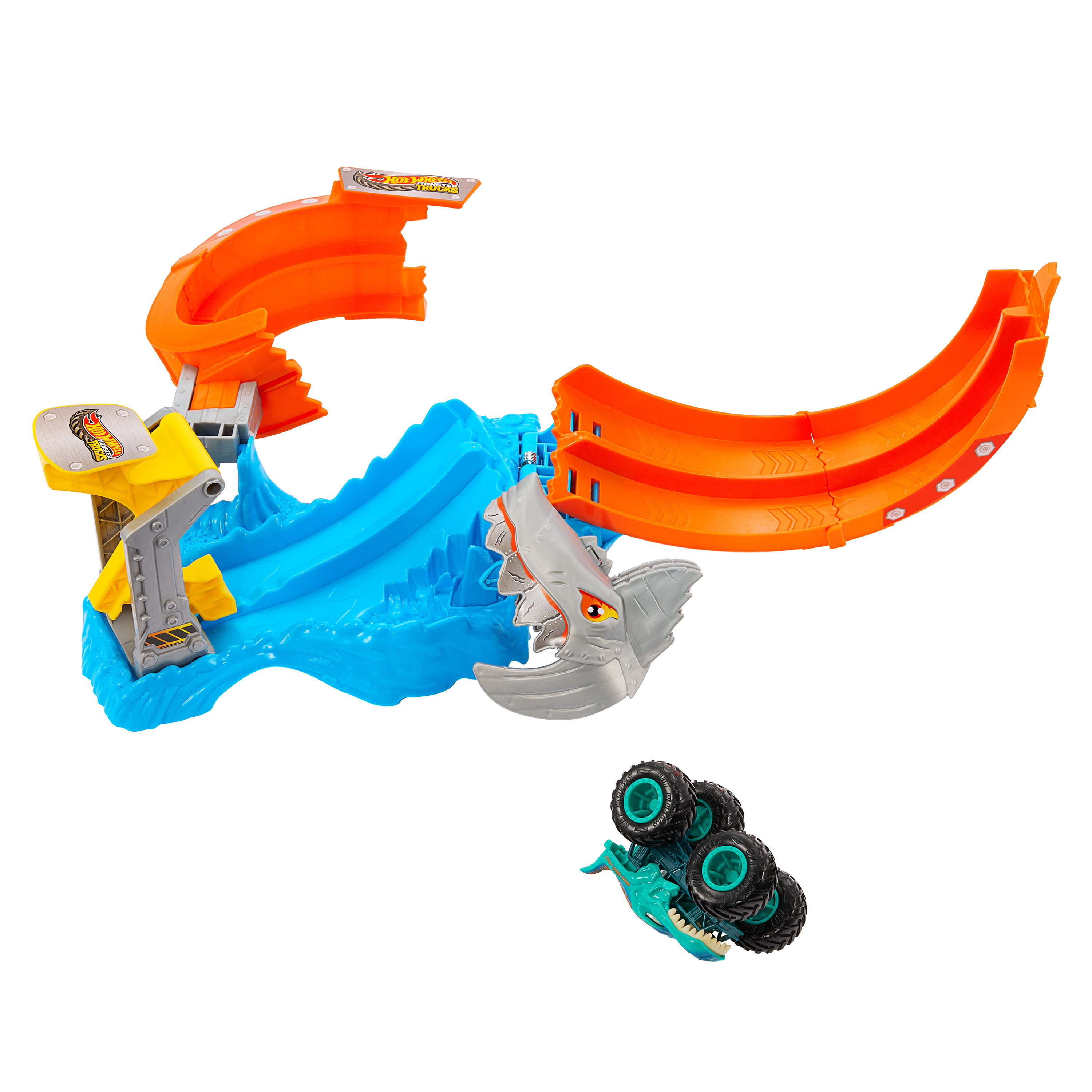 Ein Hot Wheels Monster Truck Spielset. Verfügt über eine orangefarbene Strecke, eine blaue Welle, einen Hai und einen Truck. Der Truck ist umgestürzt.