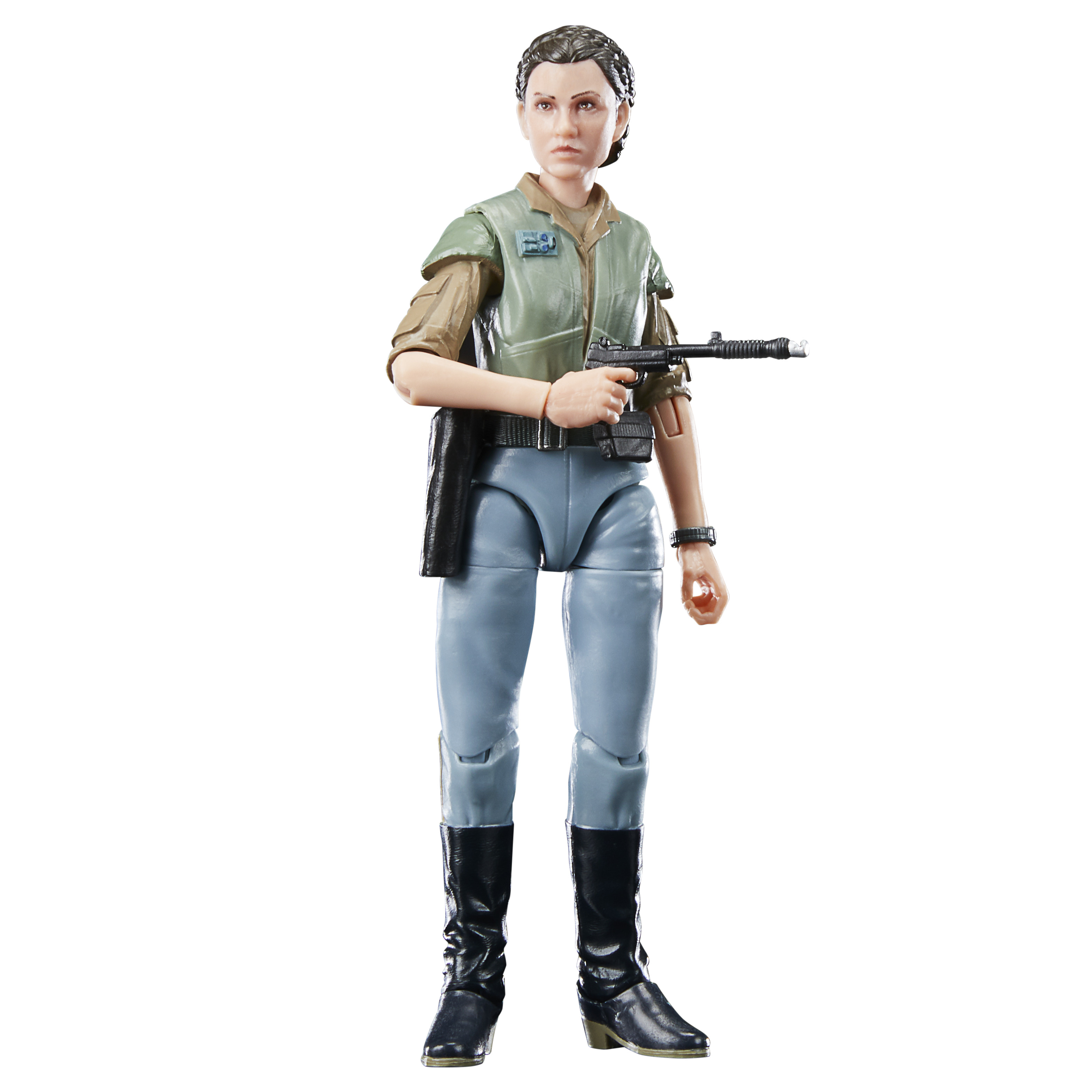 Figura de mujer con pistola. Lleva chaleco verde, pantalón azul claro, botas negras y pelo oscuro.