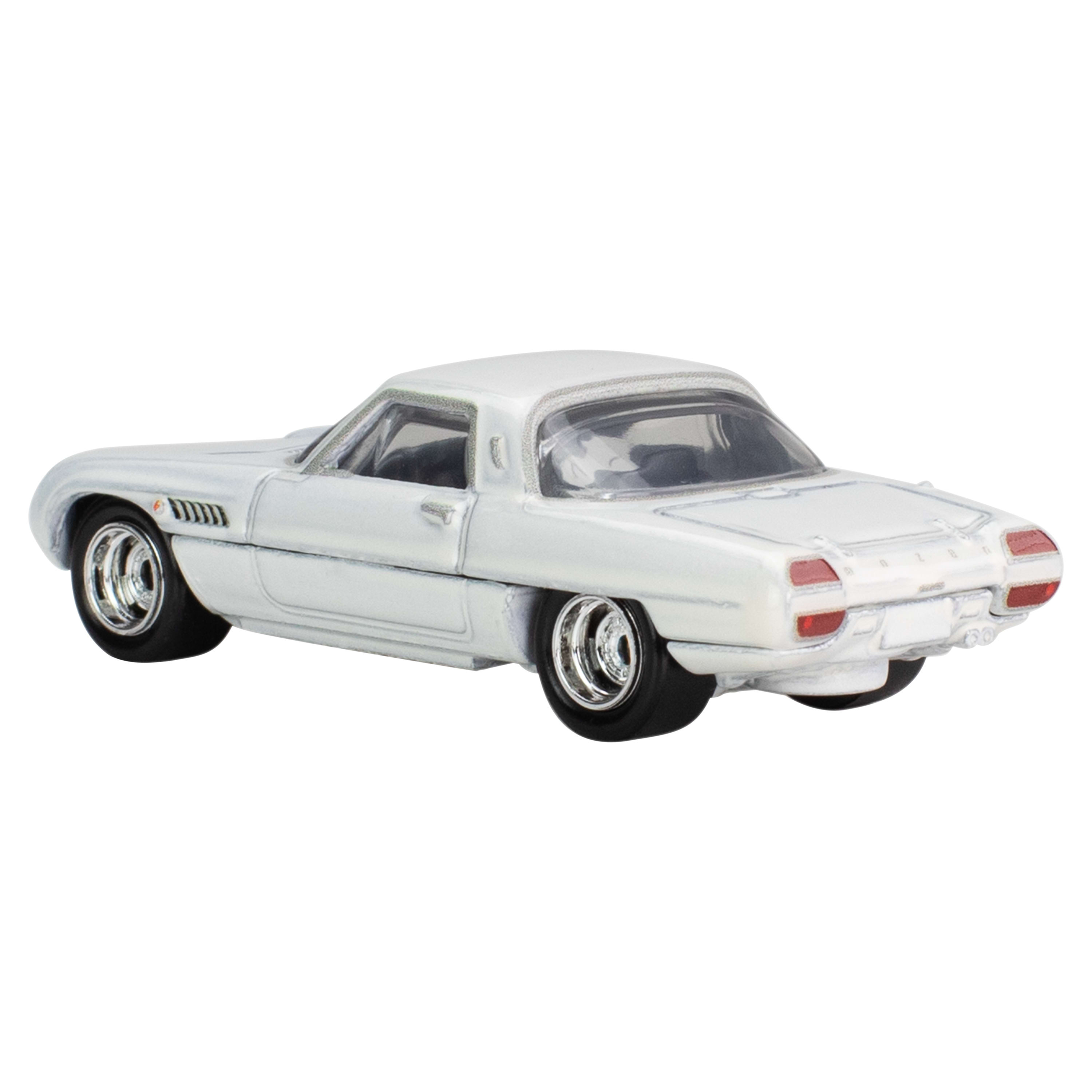 Un coche de juguete blanco con neumáticos negros sobre fondo blanco. El coche tiene llantas cromadas y luces traseras rojas.