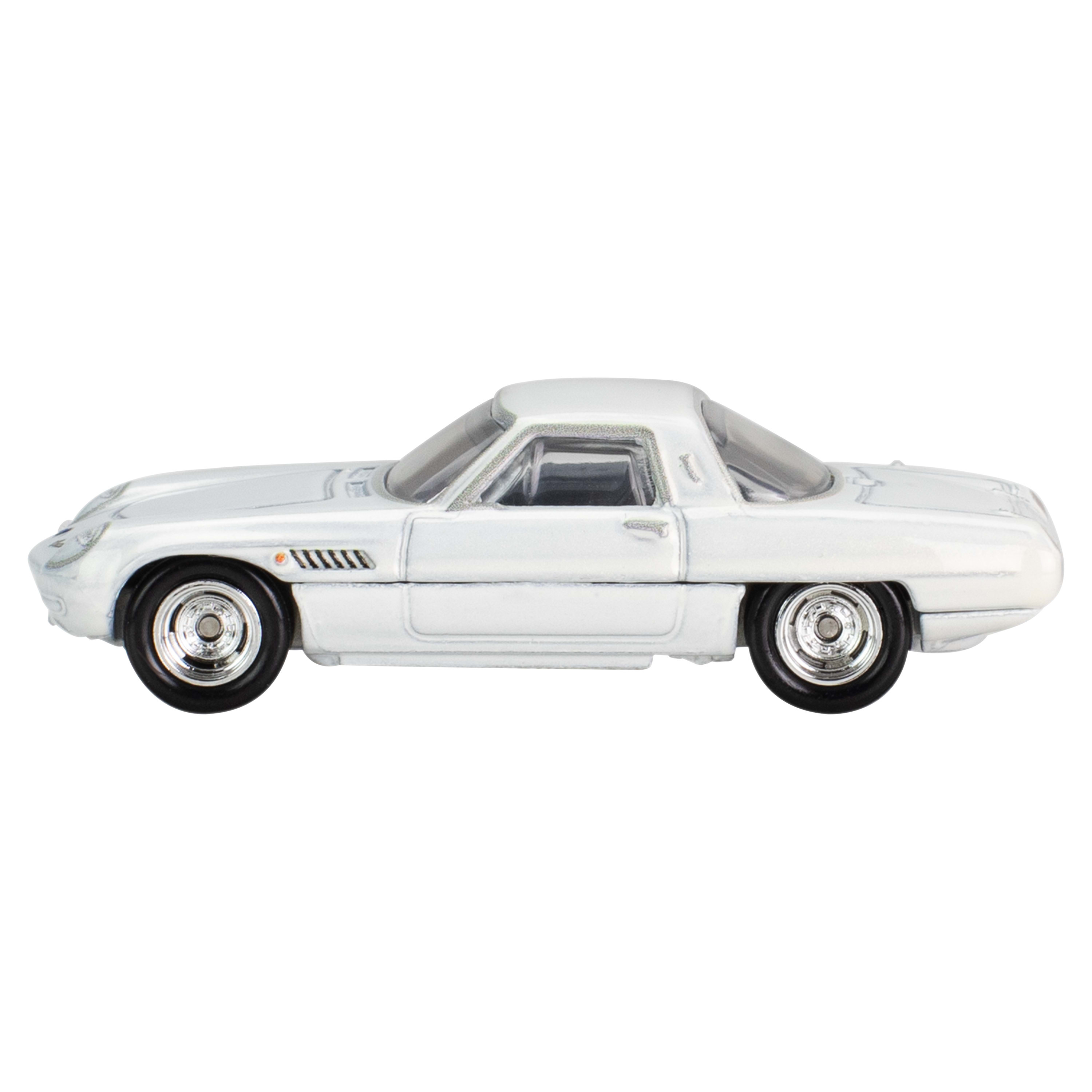 Un coche de juguete blanco sobre fondo blanco. Tiene ruedas negras y techo rígido.