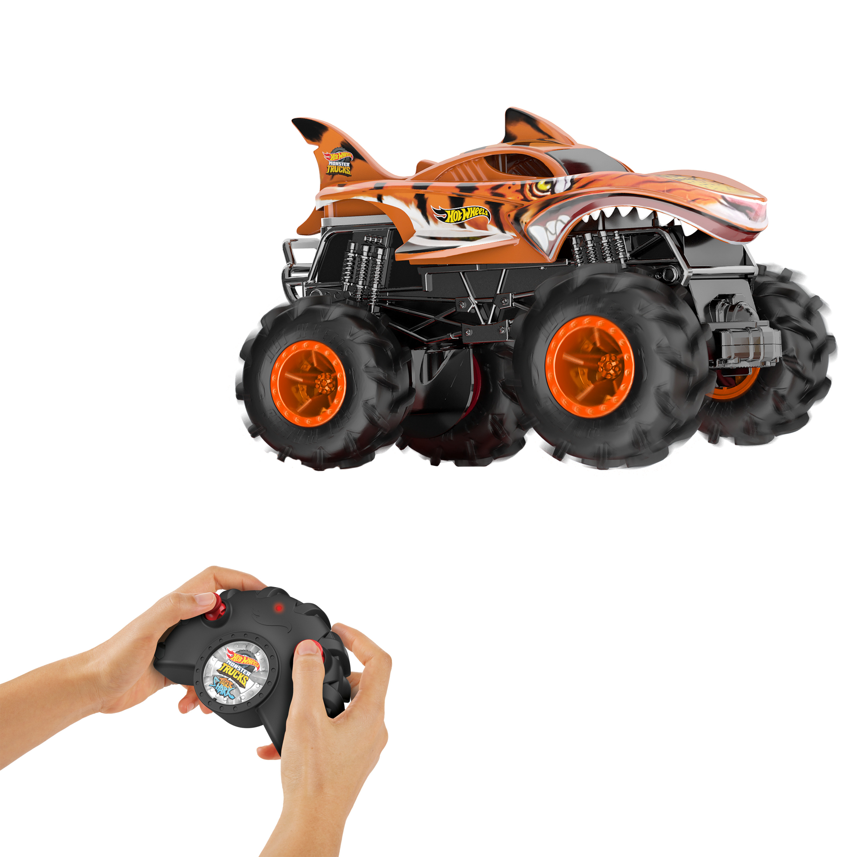 Zabawka monster truck Hot Wheels w motywie tygrysa z pilotem pokazana na białym tle.