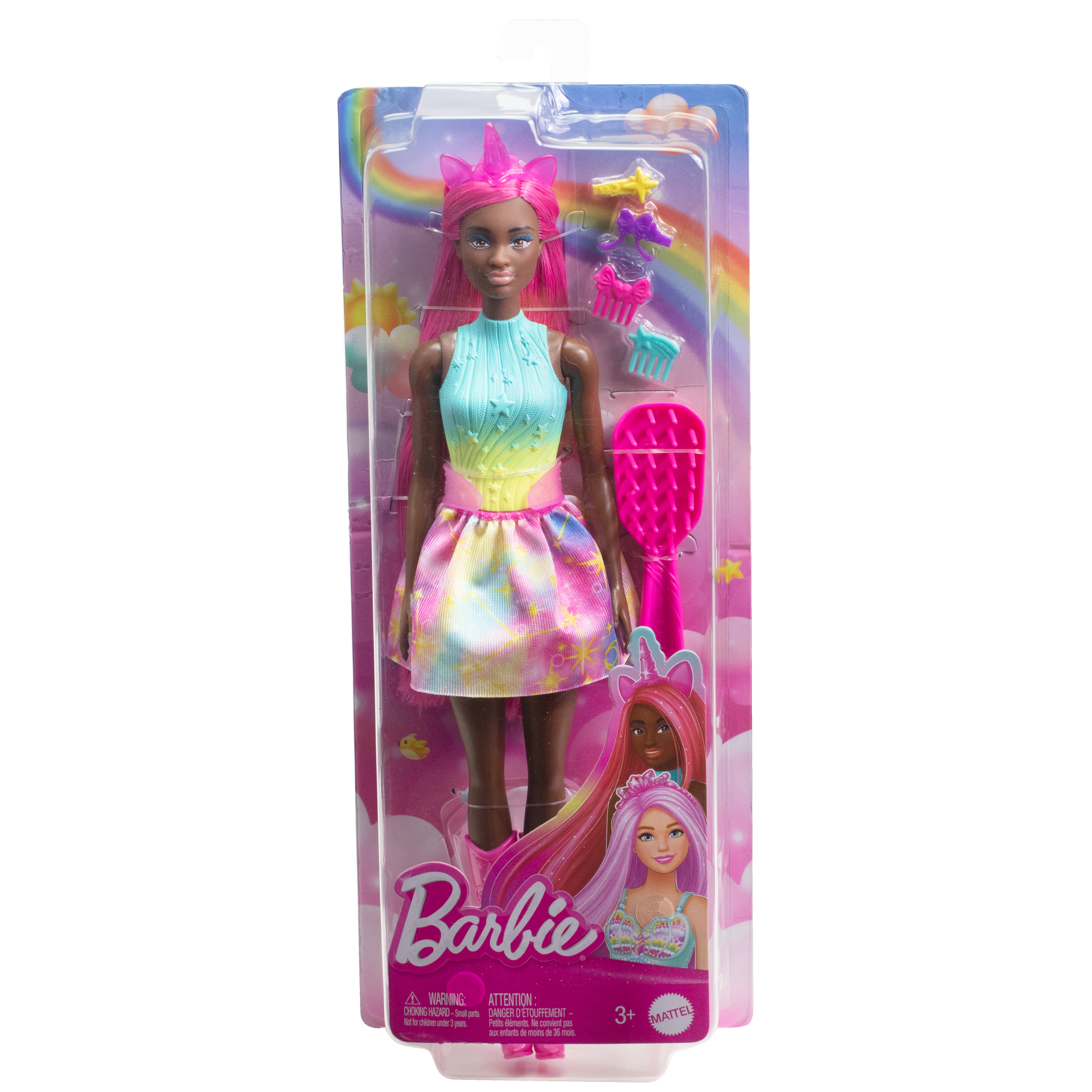Eine Barbie-Puppe in Verpackung. Es ist ein Einhorn-Thema. Die Puppe hat rosa Haare, trägt ein buntes Kleid und Accessoires.