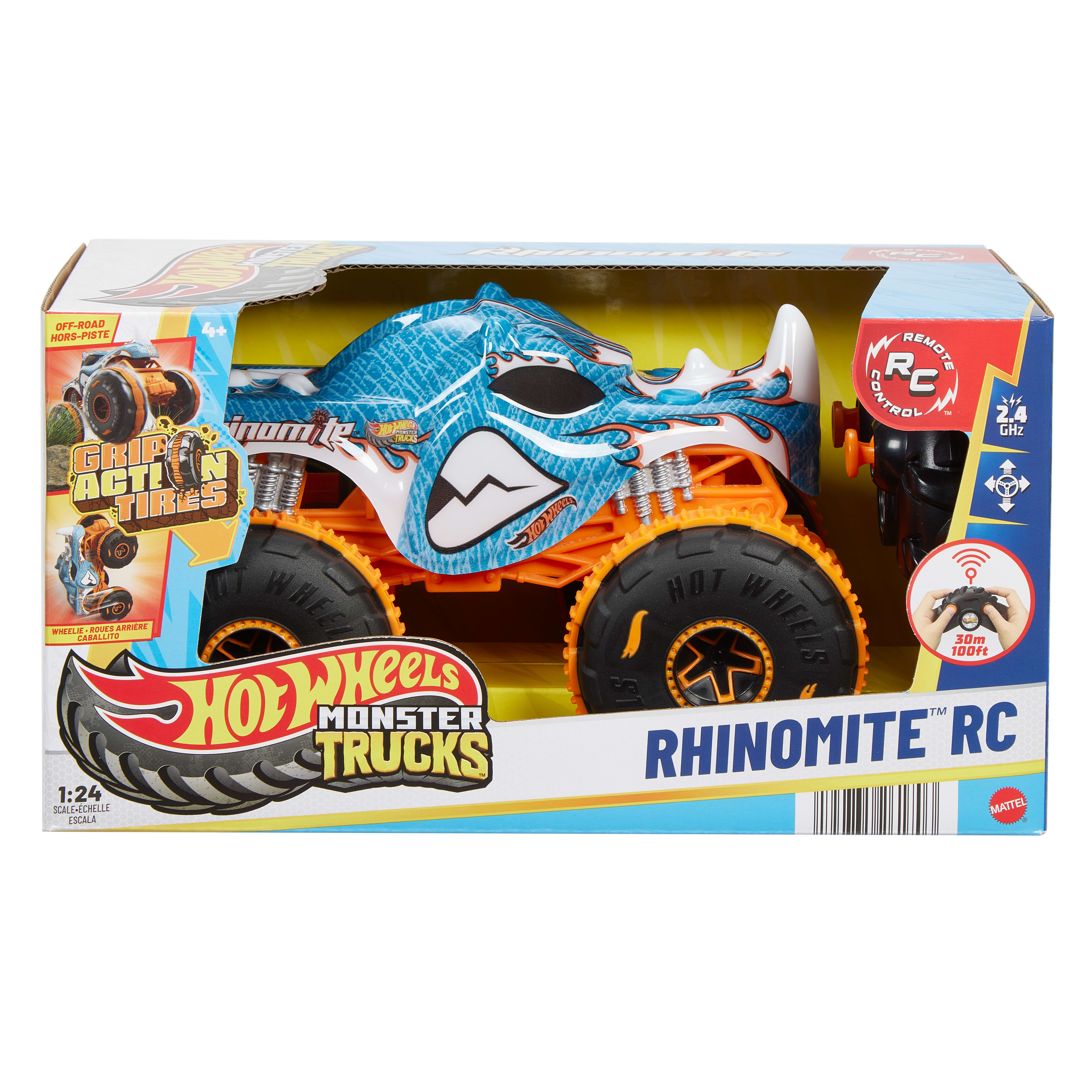 Een Hot Wheels speelgoedtruck in de doos. De truck is blauw en oranje, met grote wielen. De doos heeft tekst.