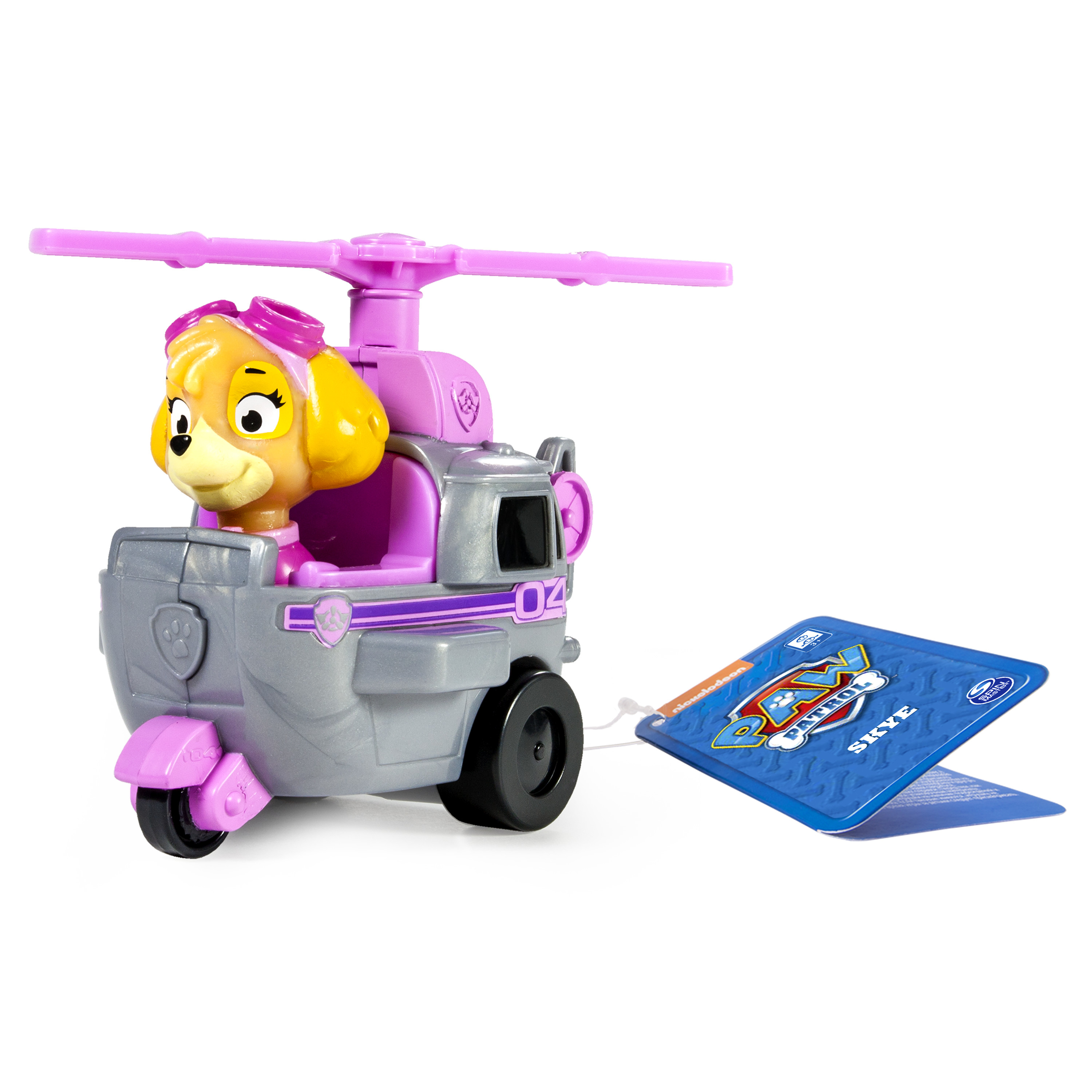 Un helicóptero de juguete de Skye de Paw Patrol, con una etiqueta. El juguete es gris, rosa y morado. El fondo es blanco.
